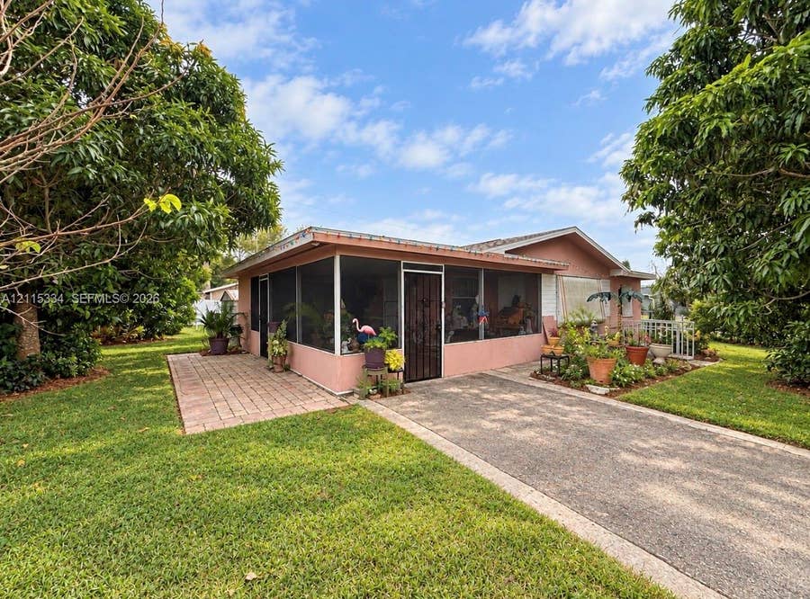 Property photo for 902 Palm Boulevard, Lehigh Acres, FL
