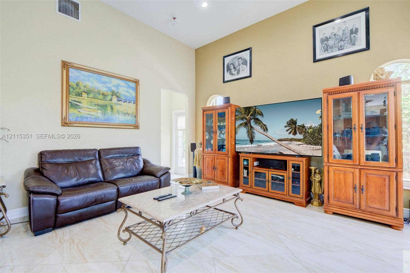 13845 NW 20th Street, Pembroke Pines, FL 33028 Vaulted ceilings, arched windows, and light-toned tile flooring