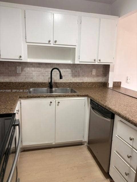9301 SW 92nd Avenue, #A418, Miami, Miami, FL 33176 Kitchen featuring white cabinetry, speckled stone-finish countertops, brick-pattern backsplash, stainless steel dishwasher, and a matte black gooseneck faucet