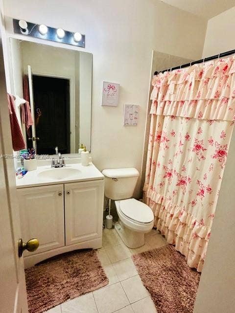 14973 SW 9th Terrace, Miami, Miami, FL 33194 Bathroom featuring a white vanity cabinet with an integrated sink, a large wall-mounted mirror, four-bulb vanity lighting, and a bathtub with a shower enclosure