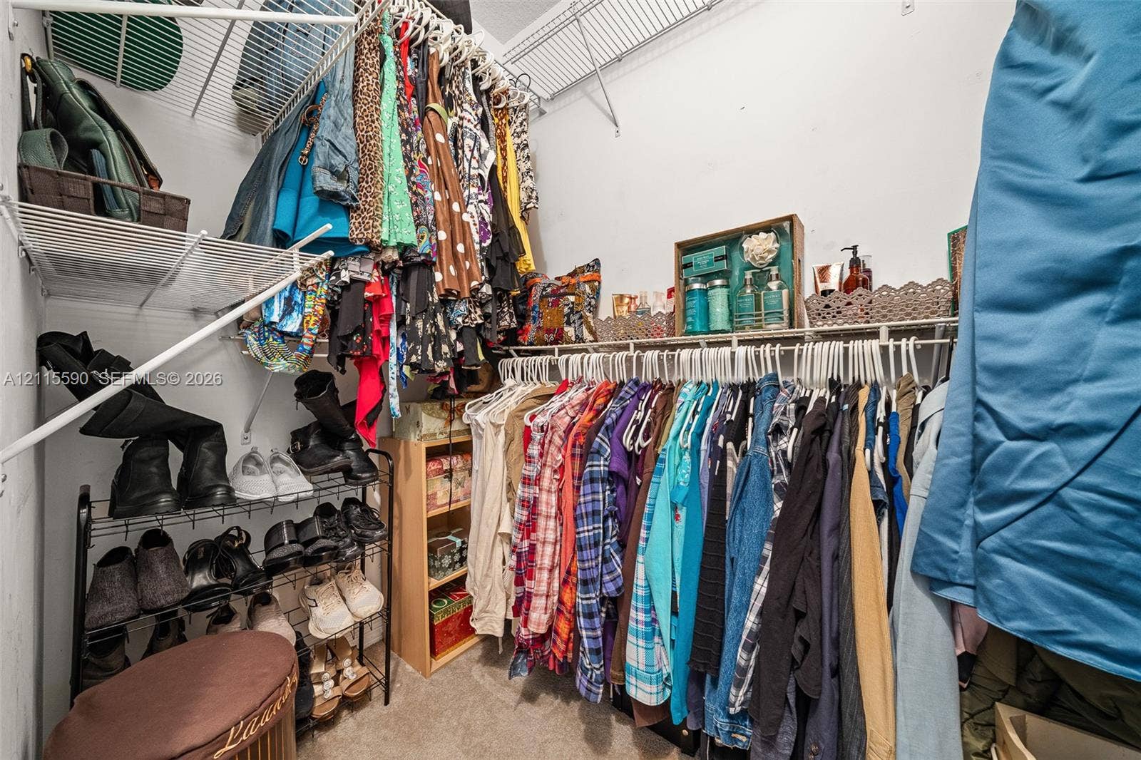 4948 Tradewinds Terrace, #504, Dania Beach, FL 33312 Walk-in storage space featuring multi-tiered white wire shelving