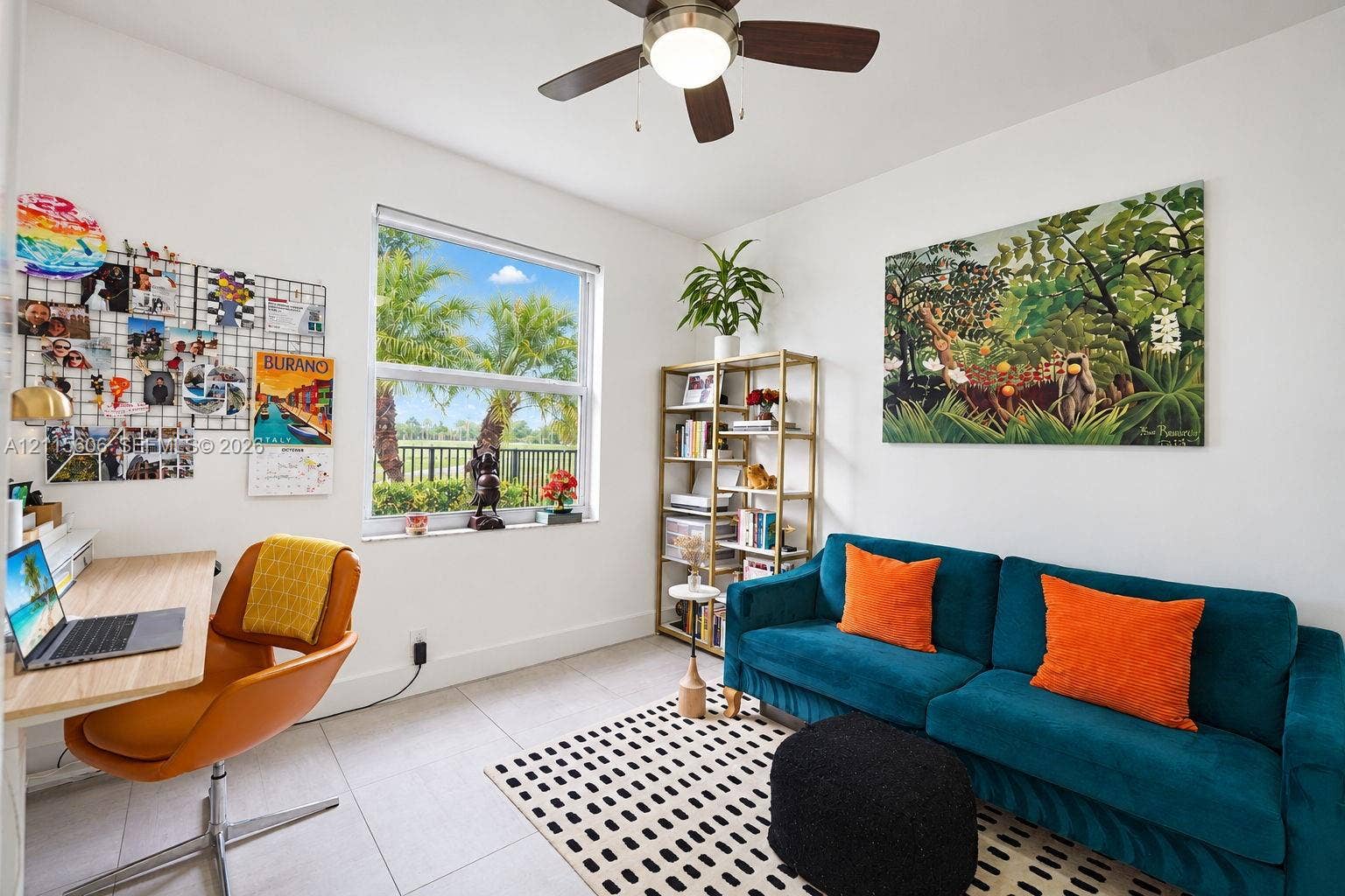 2652 Palmer Place, #2652, Weston, Weston, FL 33332 Light-filled room featuring neutral tile flooring, a large window, and an integrated ceiling fan with light fixture