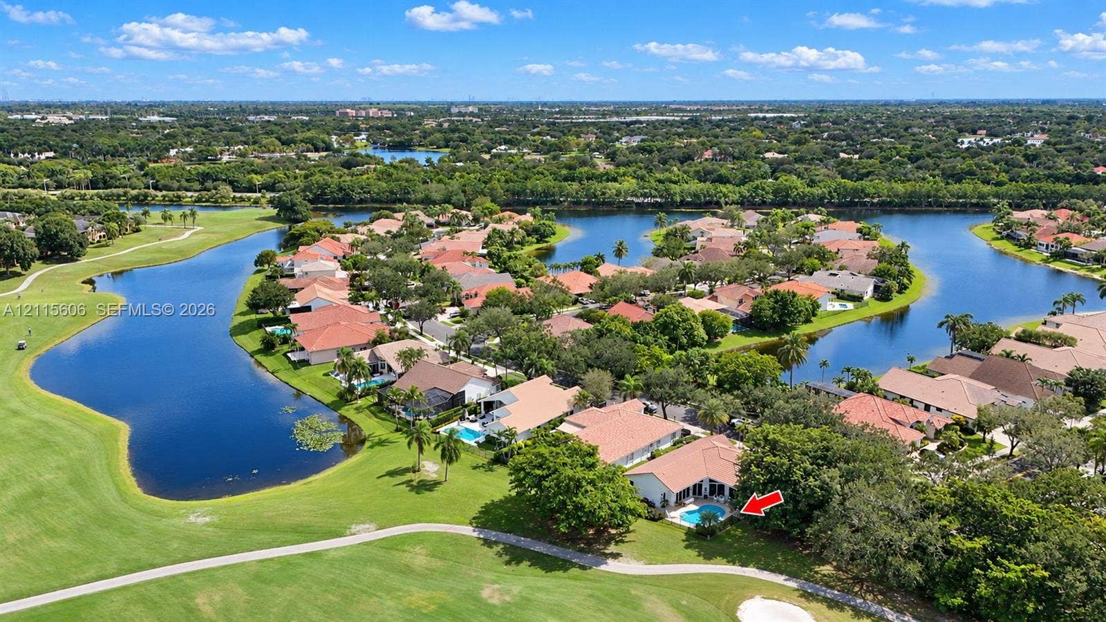 2652 Palmer Place, #2652, Weston, Weston, FL 33332 Aerial perspective featuring a waterfront property with an in-ground swimming pool and direct proximity to a golf course