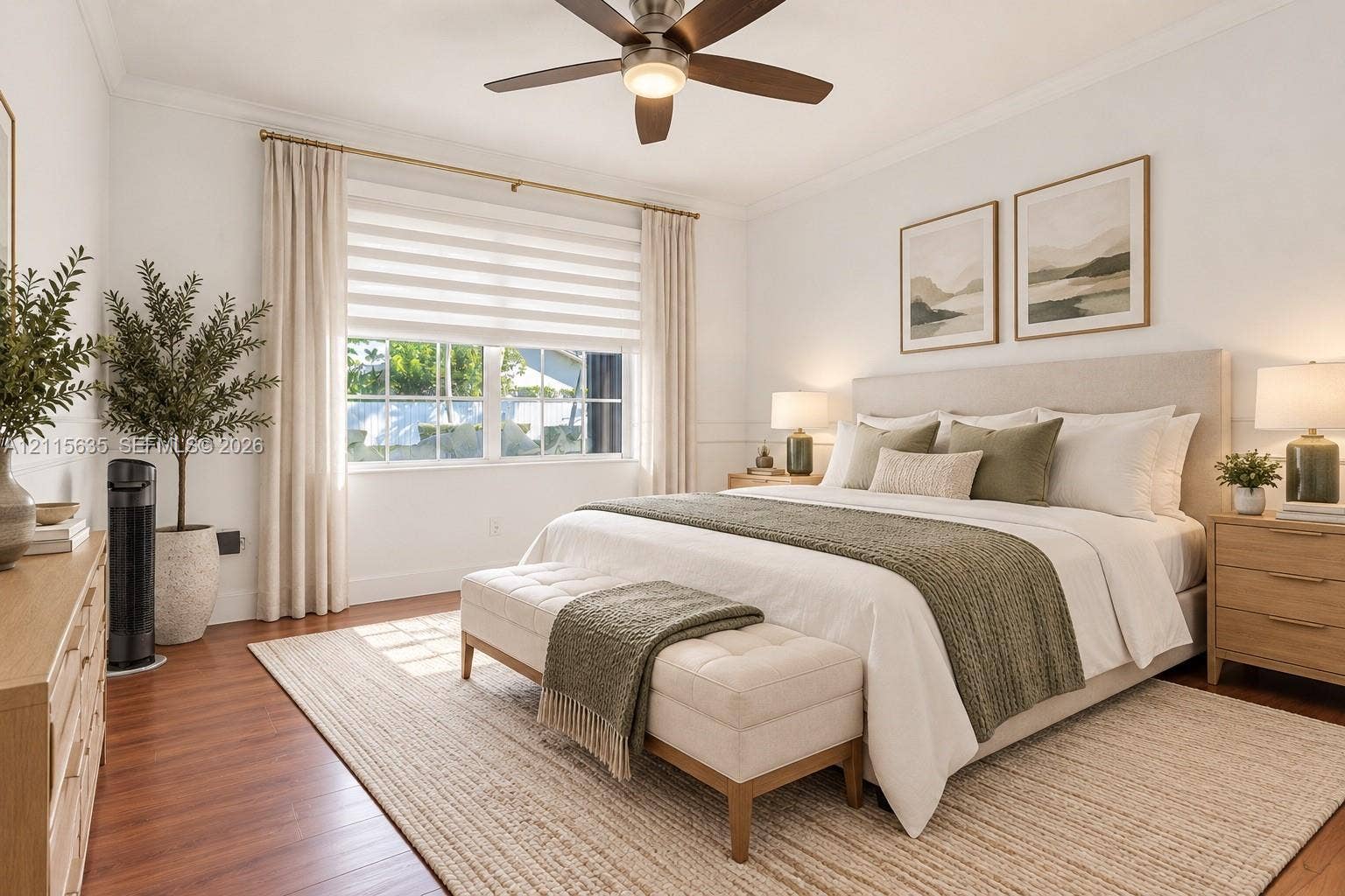 15374 SW 113th Terrace, Miami, FL 33196 Neutral-toned interior featuring wood-finish flooring, a multi-blade ceiling fan with integrated lighting, dual-pane windows, and minimalist wall molding