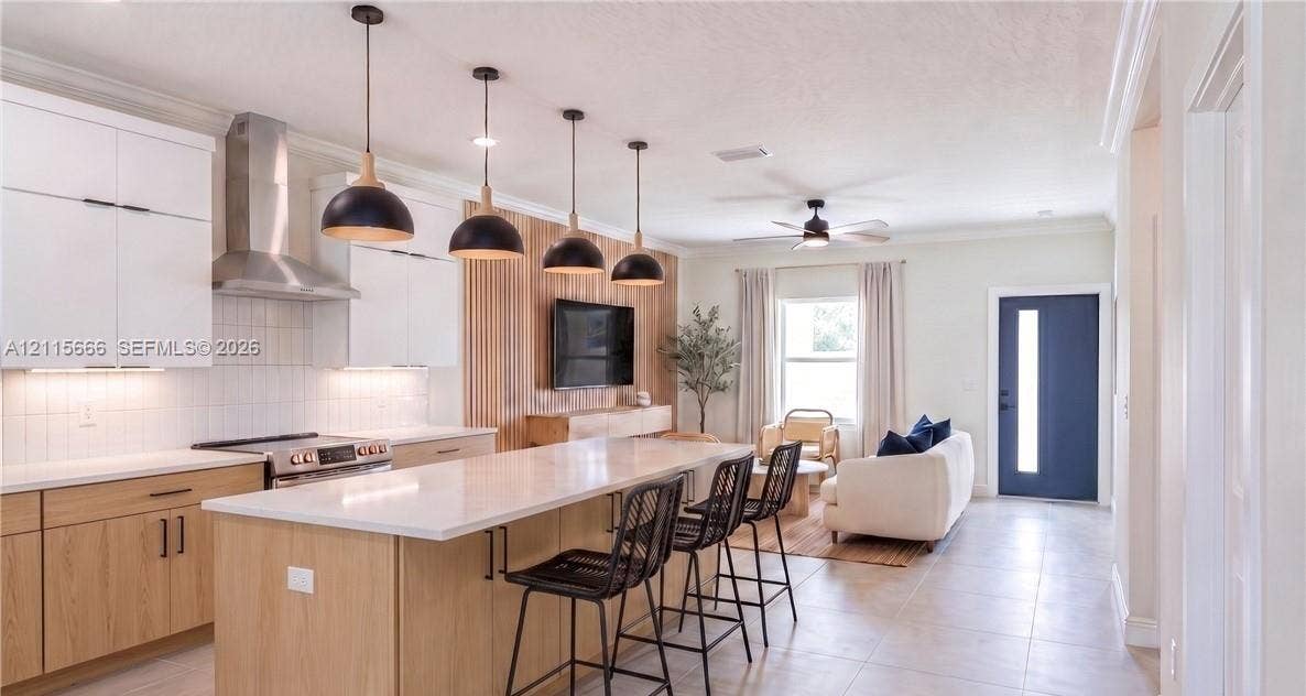 2901 E 14th Street, Lehigh Acres, FL 33972 Digital rendering, virtually staged. Actual finishes may vary.