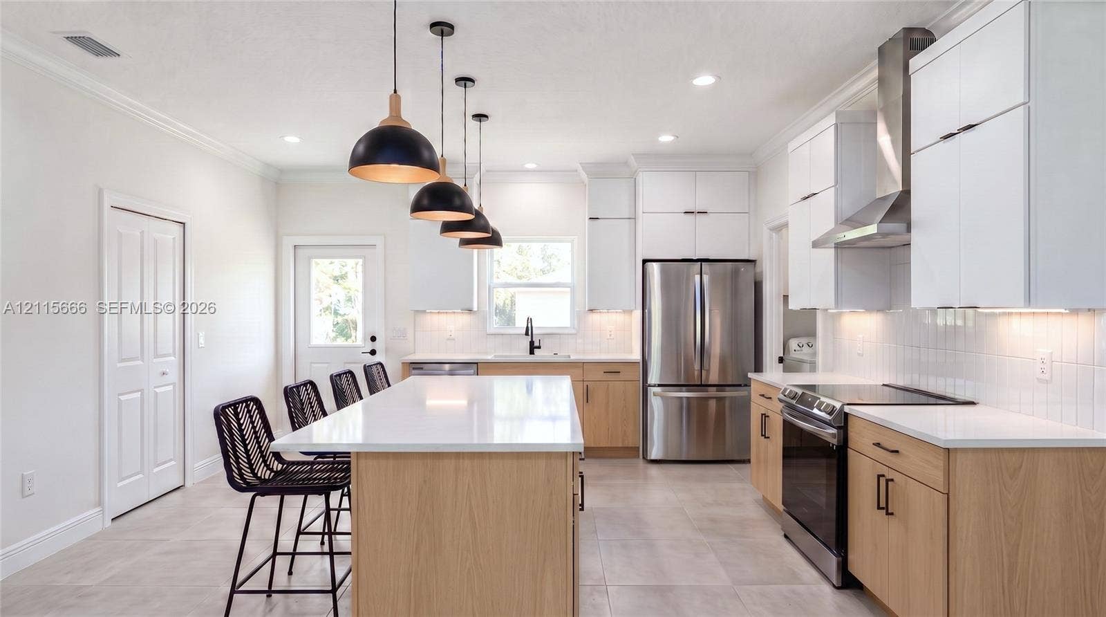 2901 E 14th Street, Lehigh Acres, FL 33972 Digital rendering, virtually staged. Actual finishes may vary.
