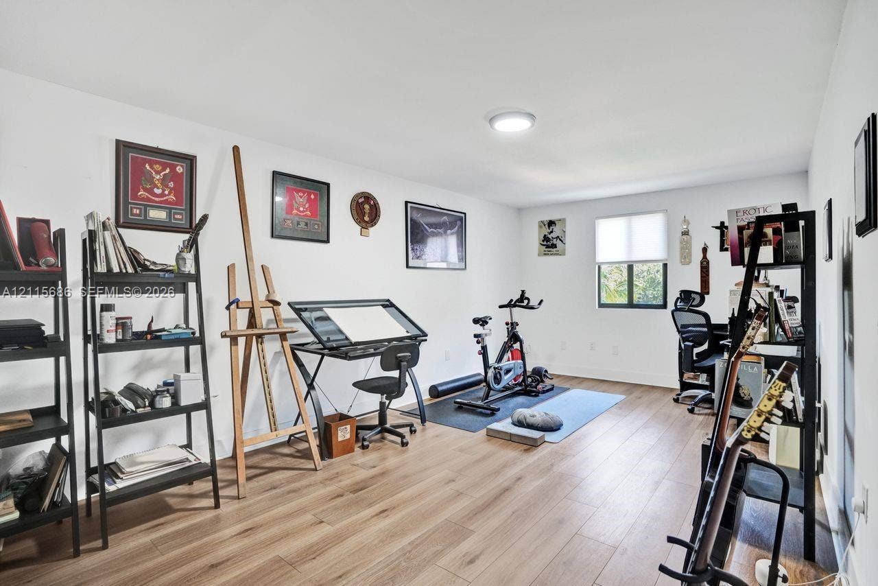 8946 SW 150th Ct Circle E, Miami, Miami, FL 33196 Multi-purpose room featuring wood-finish flooring, neutral walls, and a recessed ceiling light