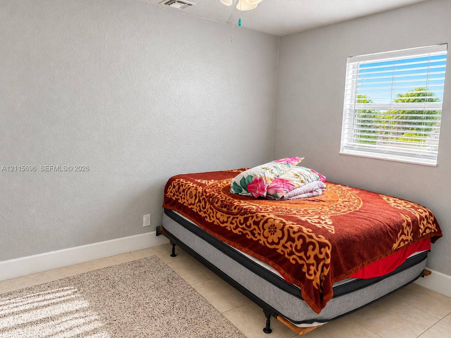 1101 NW 55th Avenue, #B, Lauderhill, Lauderhill, FL 33313 Neutral wall finishes, ceramic tile flooring, and horizontal window blinds