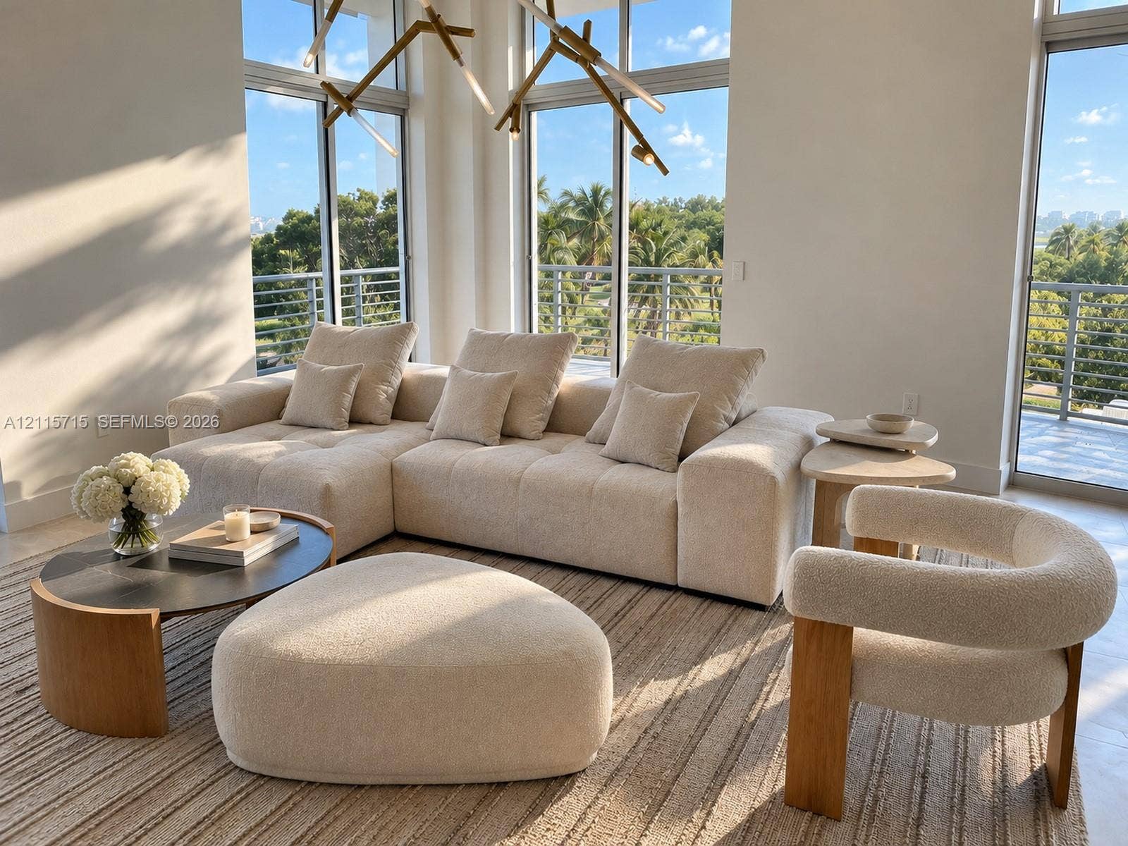 2001 Meridian Avenue, #514, Miami Beach, Miami Beach, FL 33139 Floor-to-ceiling windows, sculptural multi-arm chandelier, and polished neutral tile flooring