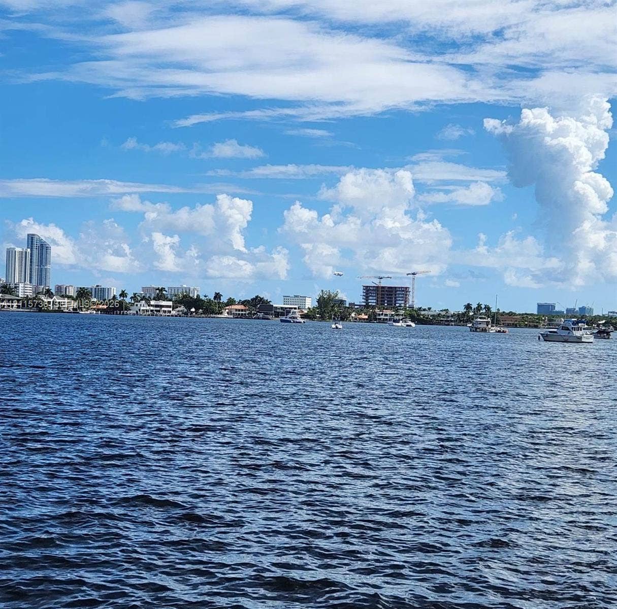 2861 Leonard Drive, #F605, Aventura, FL 33160 Wide-reaching waterfront position featuring expansive aquatic scenery, nautical traffic, and distant coastal architecture