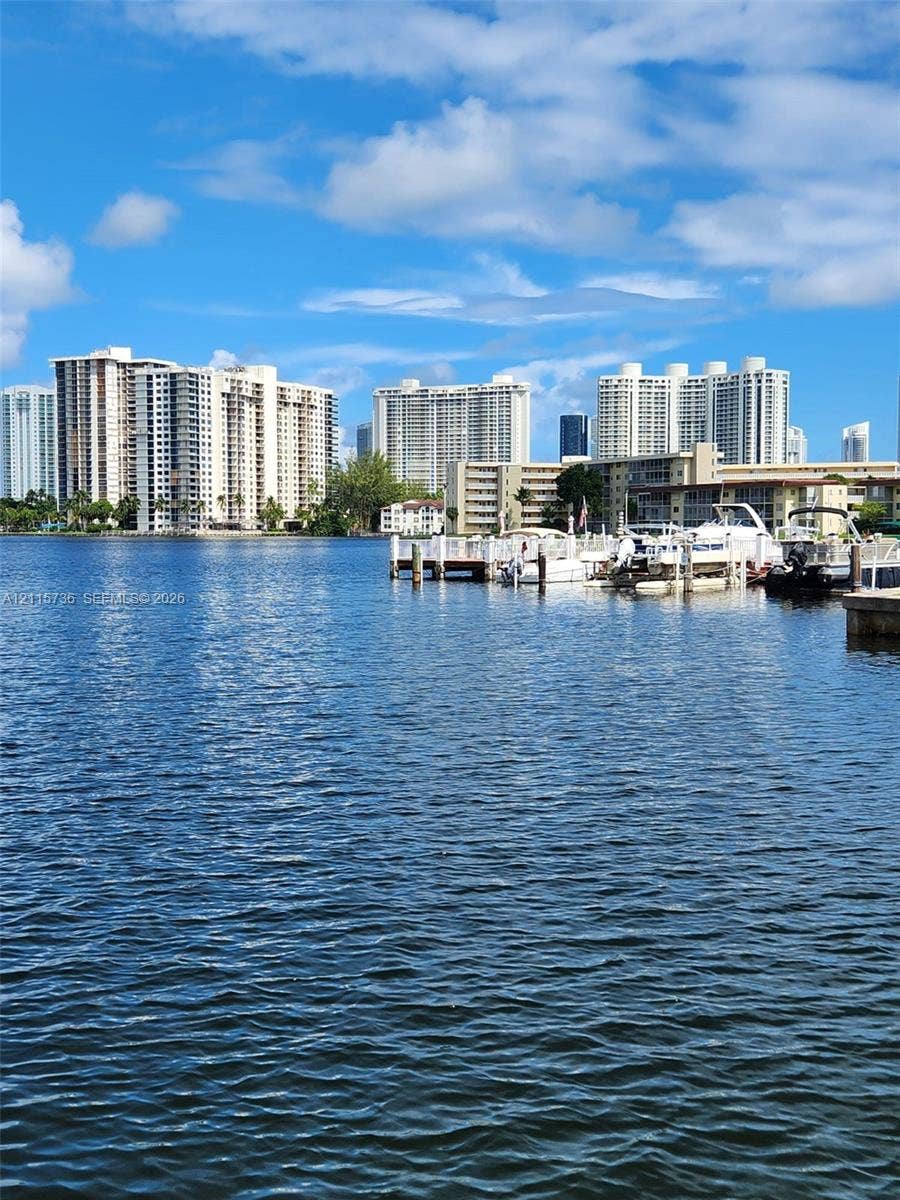 2861 Leonard Drive, #F605, Aventura, FL 33160 Waterfront property featuring a private boat dock and slip