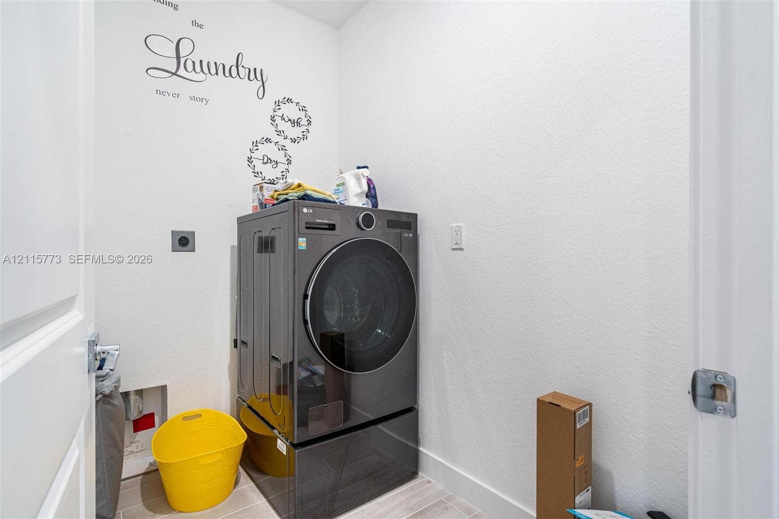 17033 SW 1st Street, #1, Pembroke Pines, Pembroke Pines, FL 33027 Dedicated utility area featuring tile flooring and integrated washer hookups
