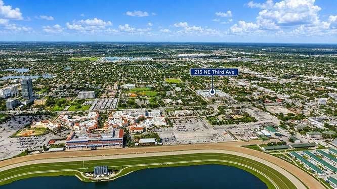 215 SE 3rd Avenue, #501B, Hallandale Beach, FL 33009 Aerial perspective of the urban landscape surrounding the property at 215 NE Third Ave, featuring proximity to expansive regional commercial centers, paved roadways, and regional infrastructure