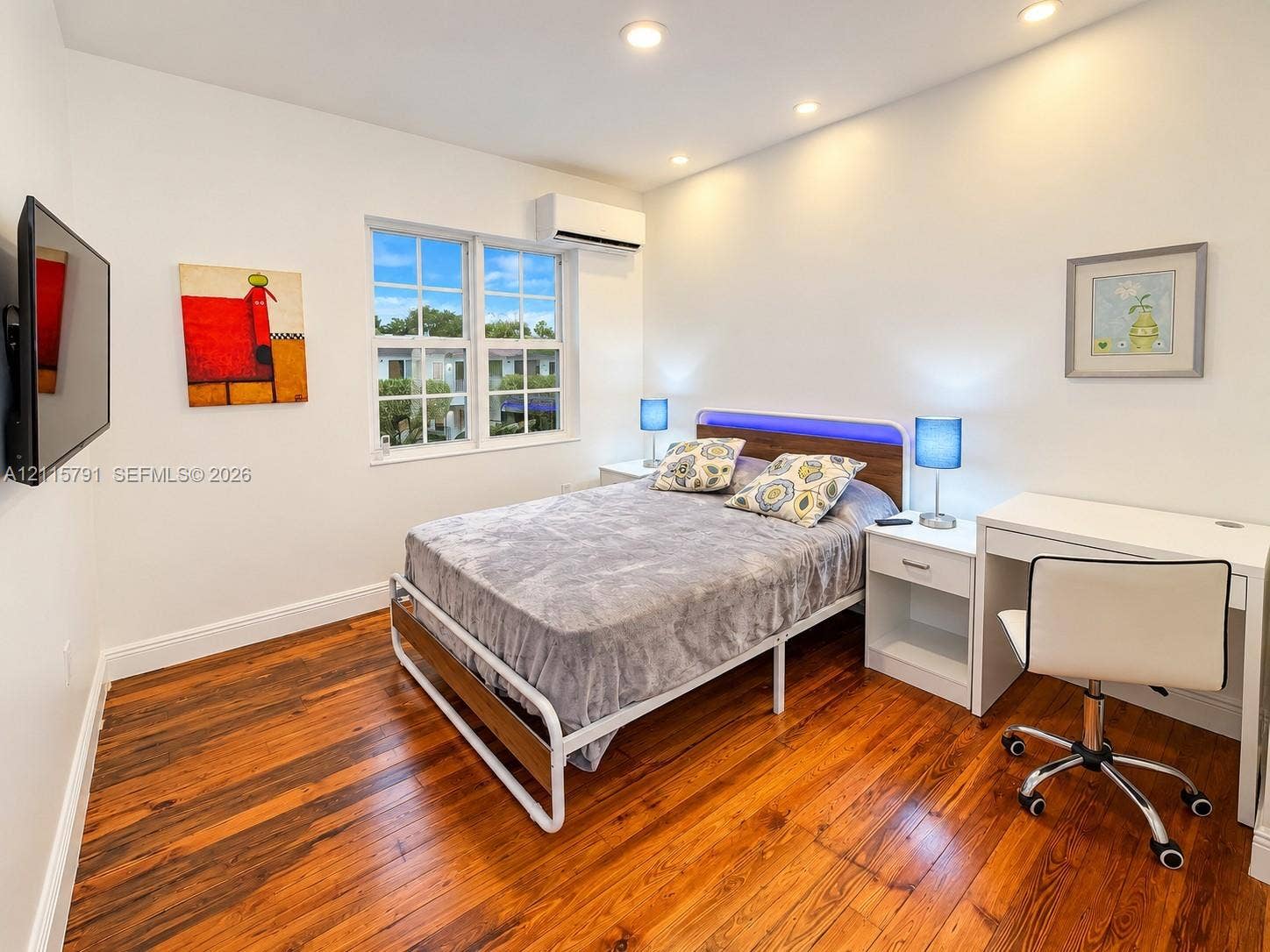 1455 Michigan Avenue, #19B, Miami Beach, Miami Beach, FL 33139 Wood-finish flooring, recessed lighting, wall-mounted ductless climate control unit, and multi-pane window