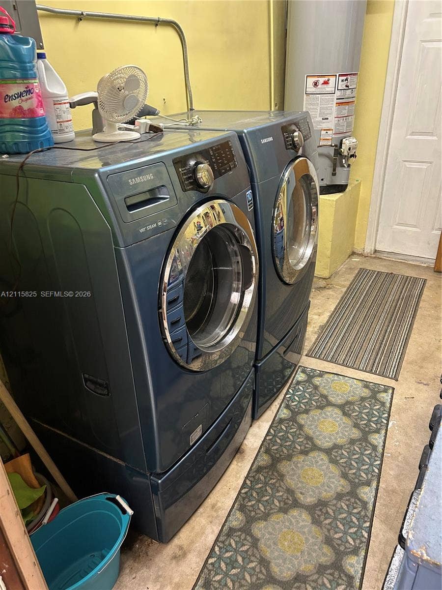 7130 W 12th Court, Hialeah, FL 33014 Built-in water heater with metal supply lines and panel door
