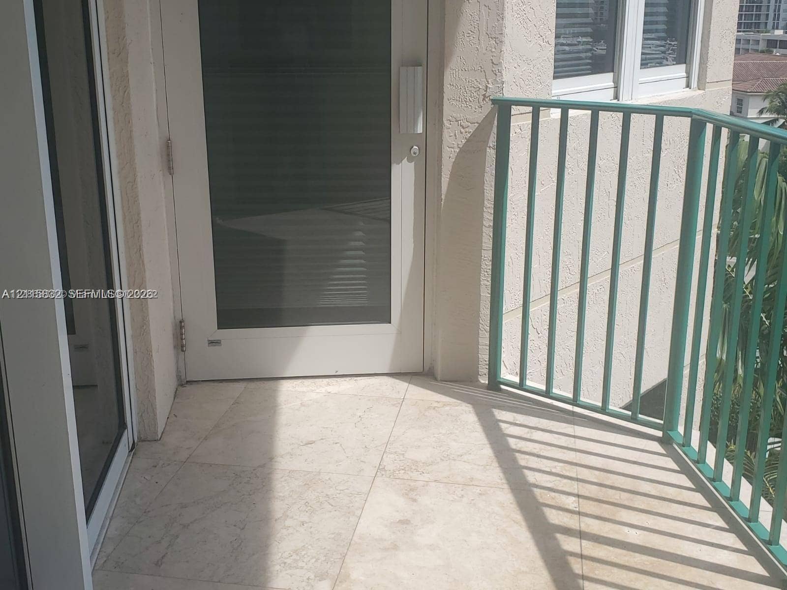 19900 E Country Club Drive, #607, Aventura, Aventura, FL 33180 Balcony featuring light-toned stone-finish flooring and a metal railing