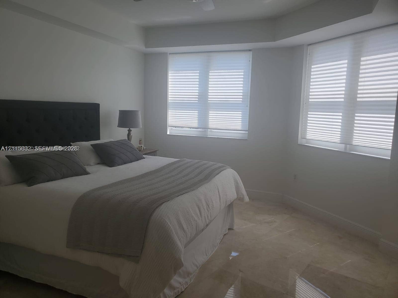 19900 E Country Club Drive, #607, Aventura, Aventura, FL 33180 Neutral-toned flooring, multi-pane windows, and recessed ceiling detailing