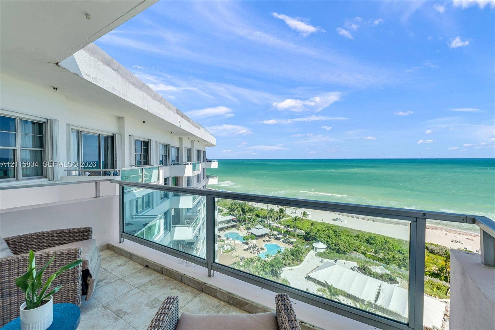 5161 Collins Avenue, #1717, Miami Beach, Miami Beach, FL 33140 Private balcony featuring tile flooring and a glass-paneled railing overlooking the ocean and coastline