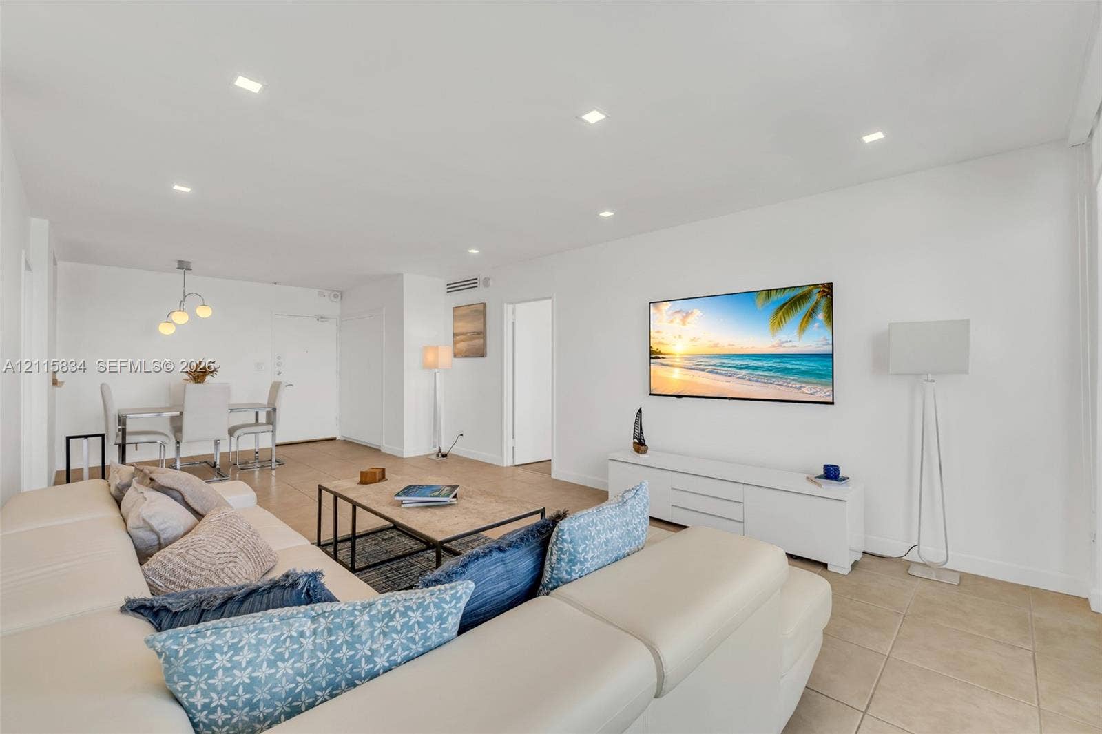 5161 Collins Avenue, #1717, Miami Beach, Miami Beach, FL 33140 Open-concept interior featuring large-format tile flooring, recessed ceiling lighting, and crisp white wall finishes