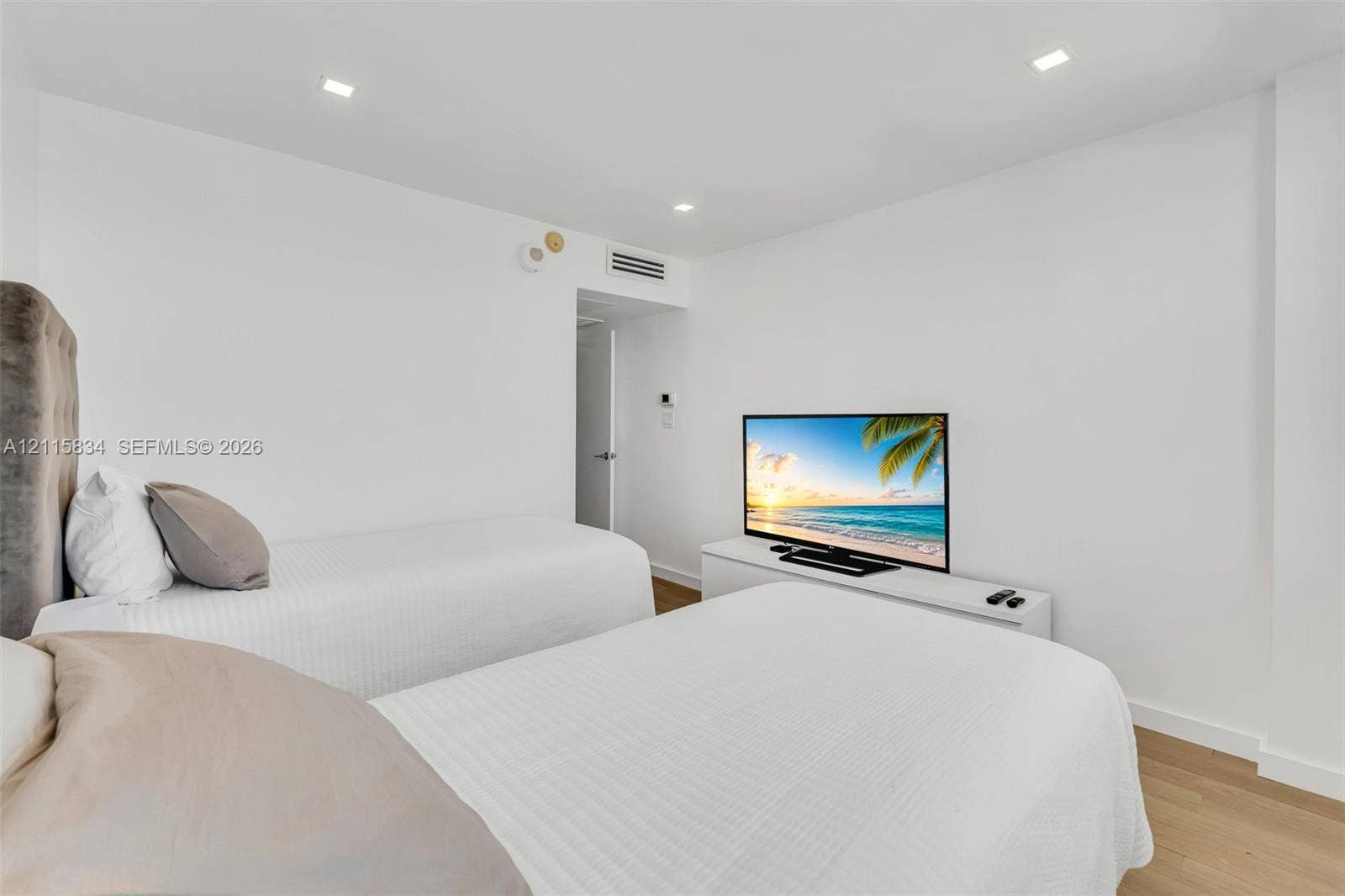 5161 Collins Avenue, #1717, Miami Beach, Miami Beach, FL 33140 Interior space featuring recessed lighting, wood-finish flooring, and crisp white walls