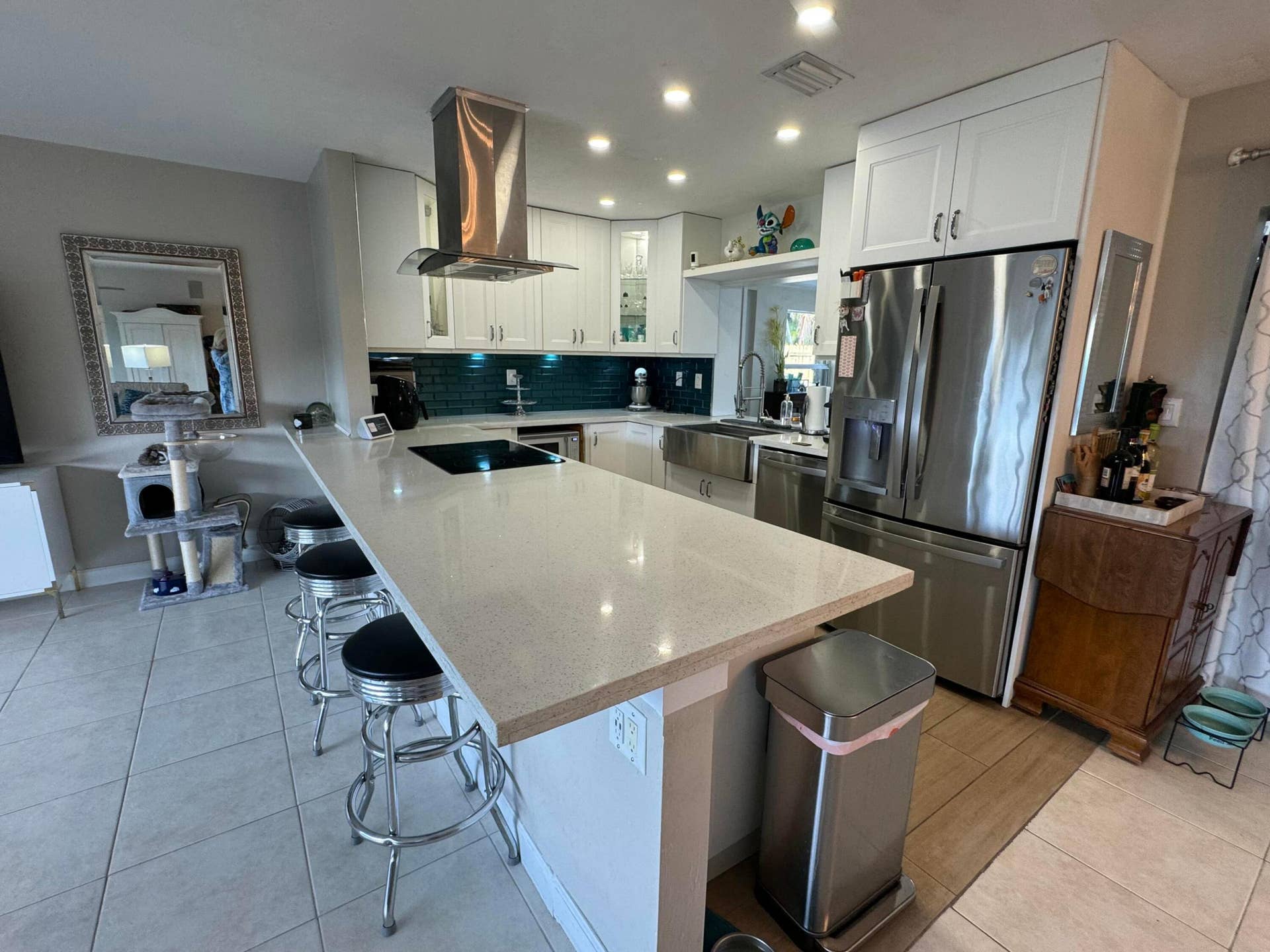 Sleek Modern Kitchen, SS appliances, plenty of bar seating