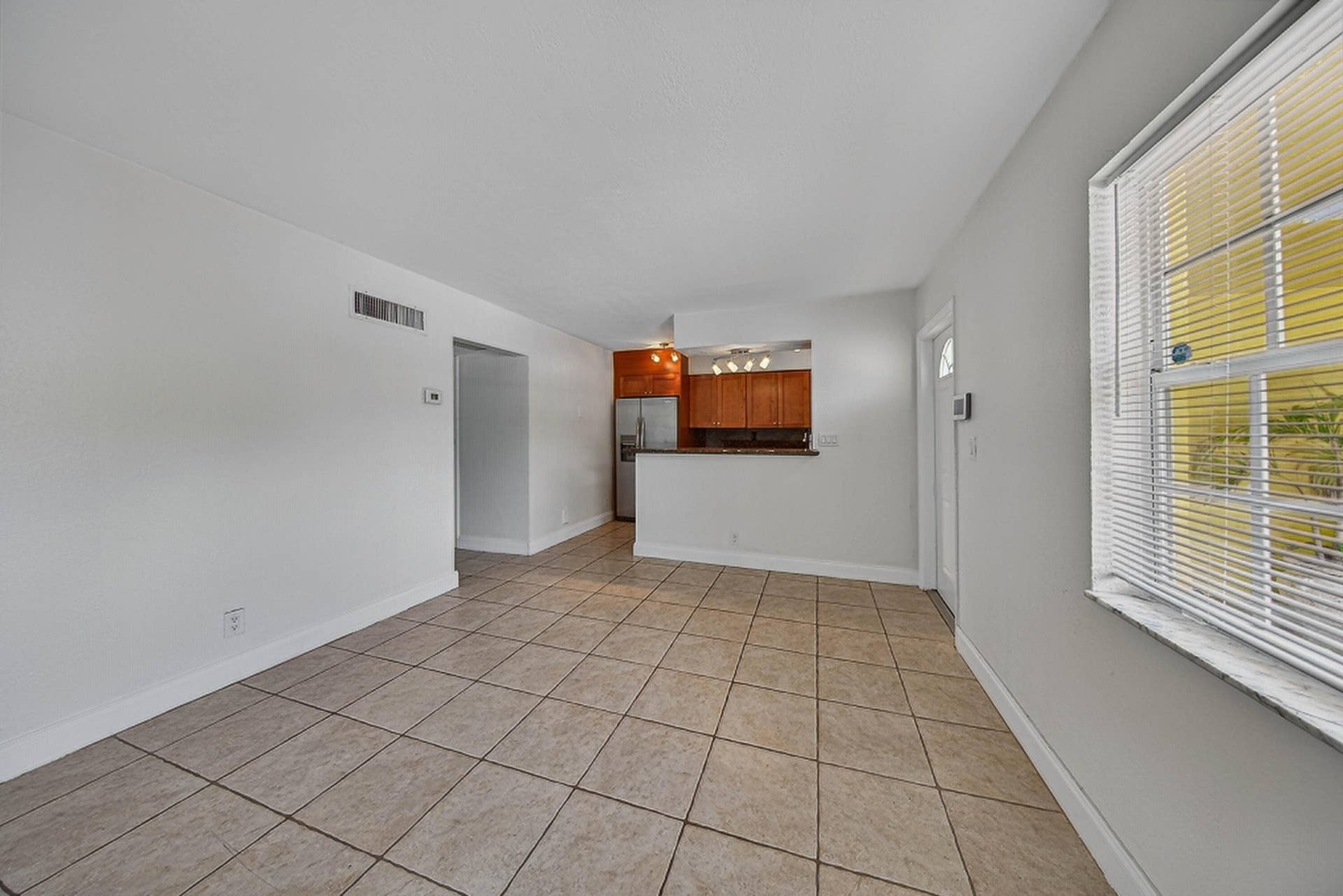 51 NE 24th Street, #4, Wilton Manors, FL 33305 Living Room with view toward kitchen