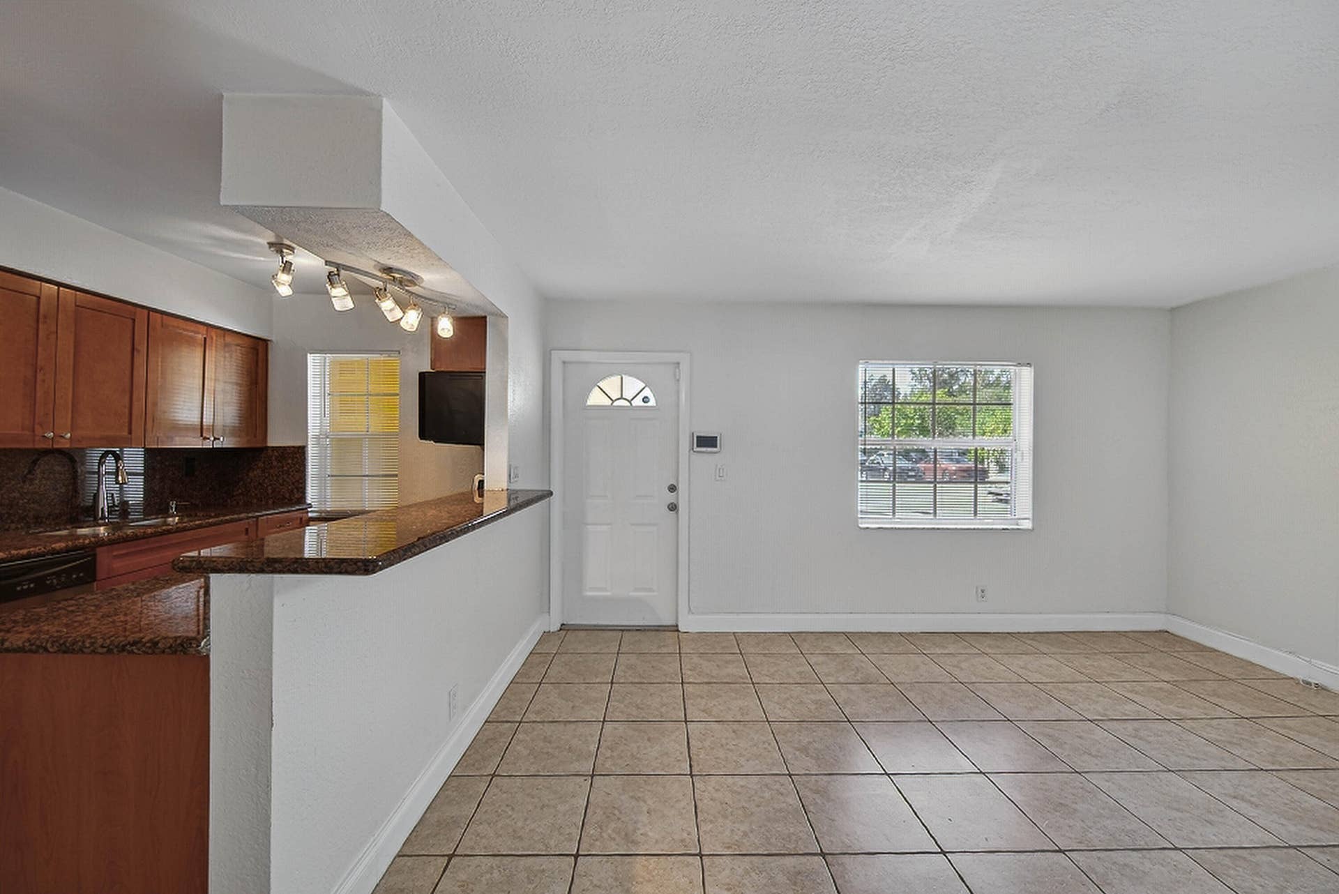 51 NE 24th Street, #4, Wilton Manors, FL 33305 Kitchen and Living Room toward front door