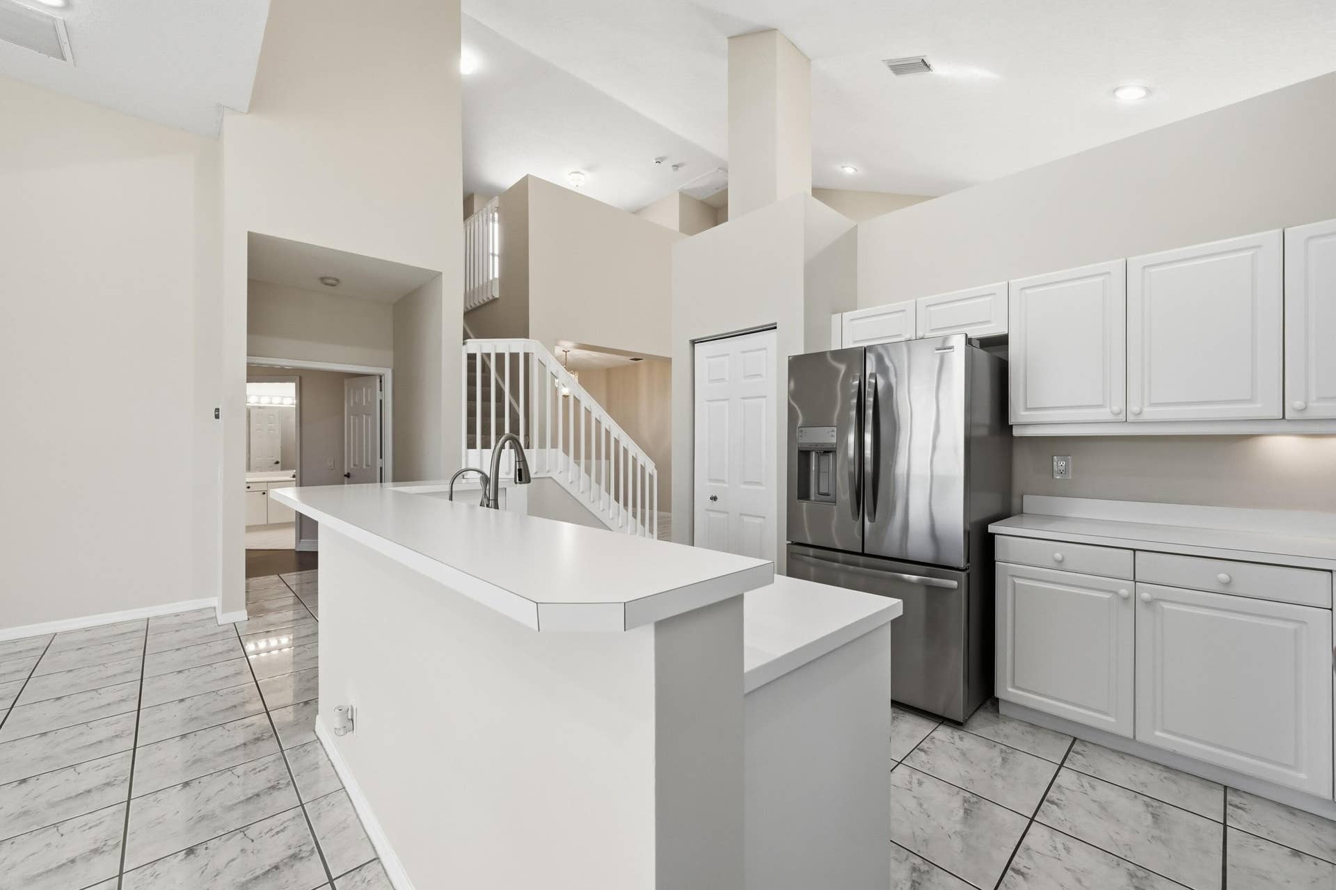 1589 NW 121st Drive, Coral Springs, FL 33071 KITCHEN WITH NEWER STAINLESS STEEL APPLIANCES