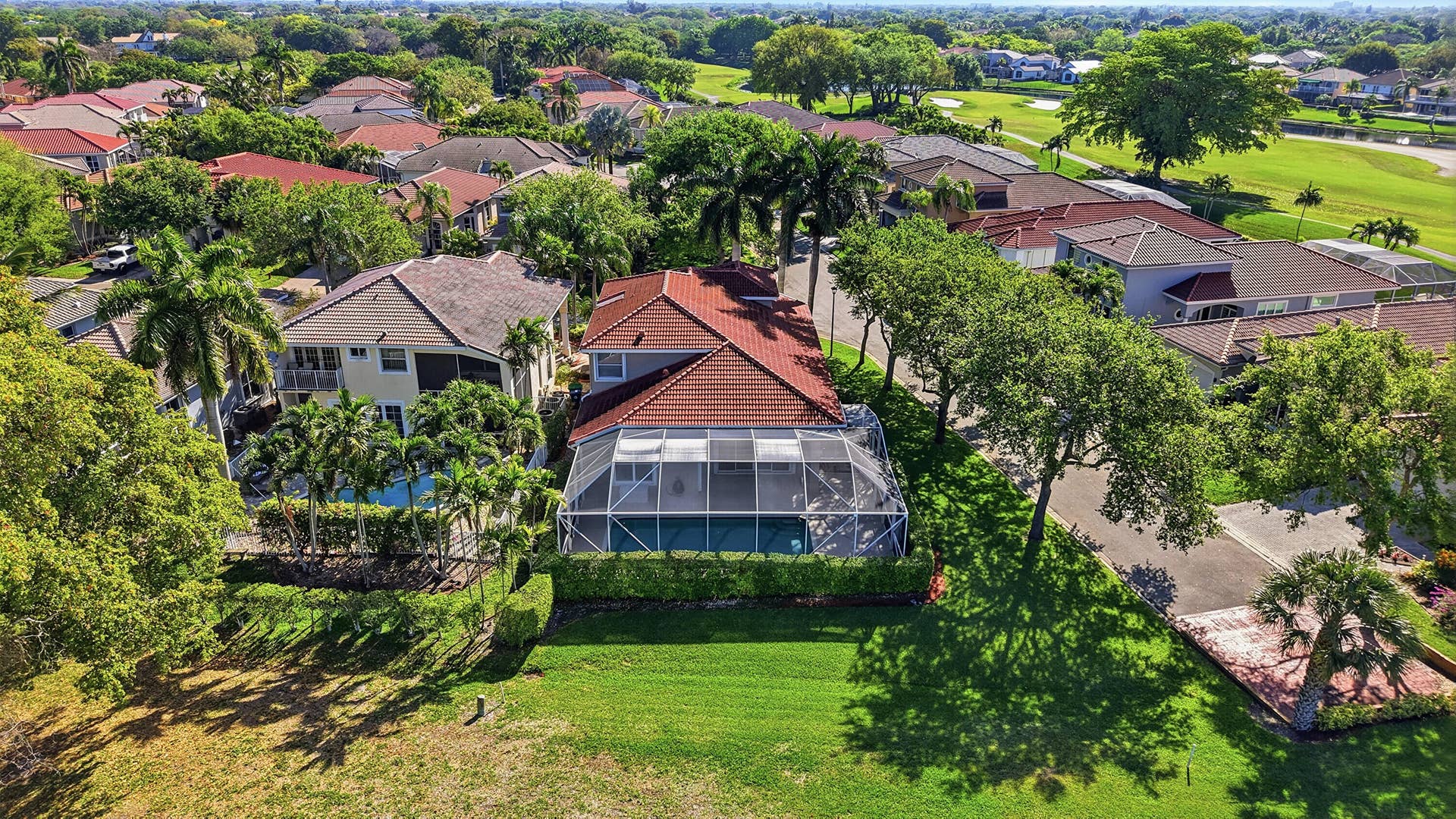 1589 NW 121st Drive, Coral Springs, FL 33071 REAR VIEW OF THE HOME WITH GOLF & SUNSET VIEWS