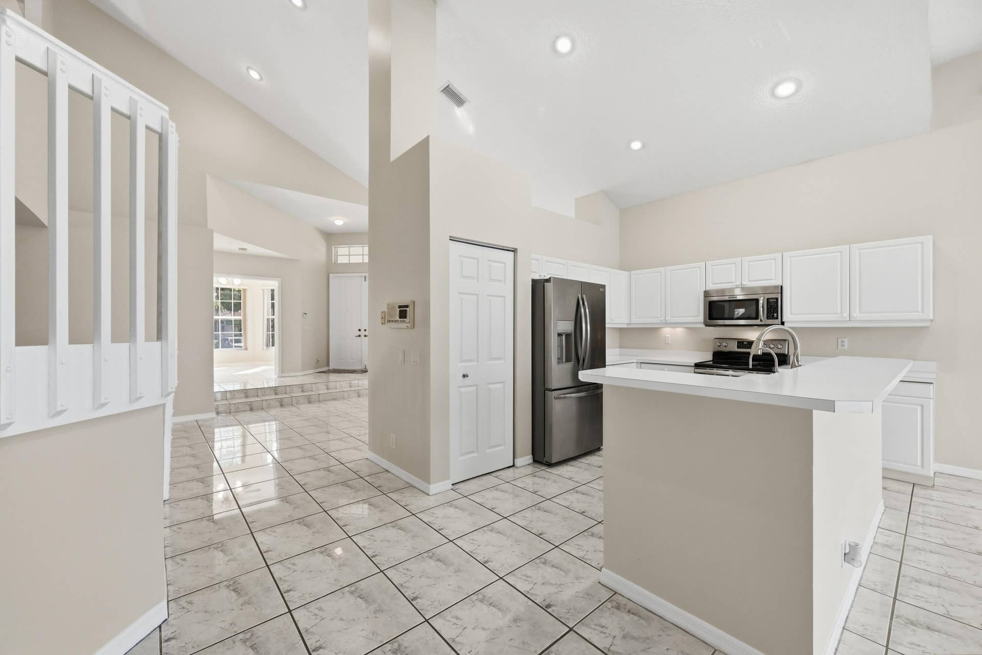 1589 NW 121st Drive, Coral Springs, FL 33071 KITCHEN WITH NEWER STAINLESS STEEL APPLIANCES