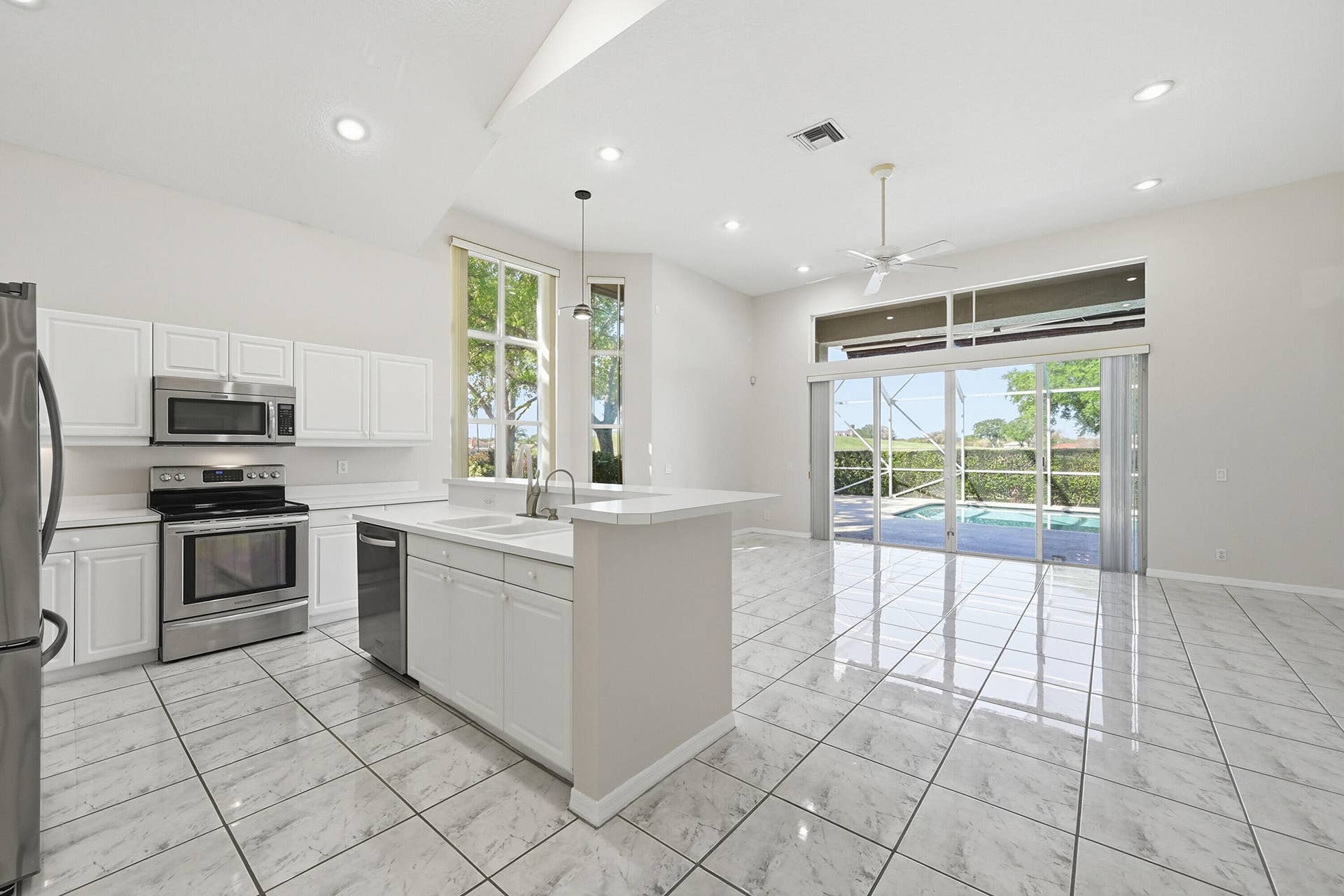 1589 NW 121st Drive, Coral Springs, FL 33071 Kitchen / Breakfast Area & Family Room