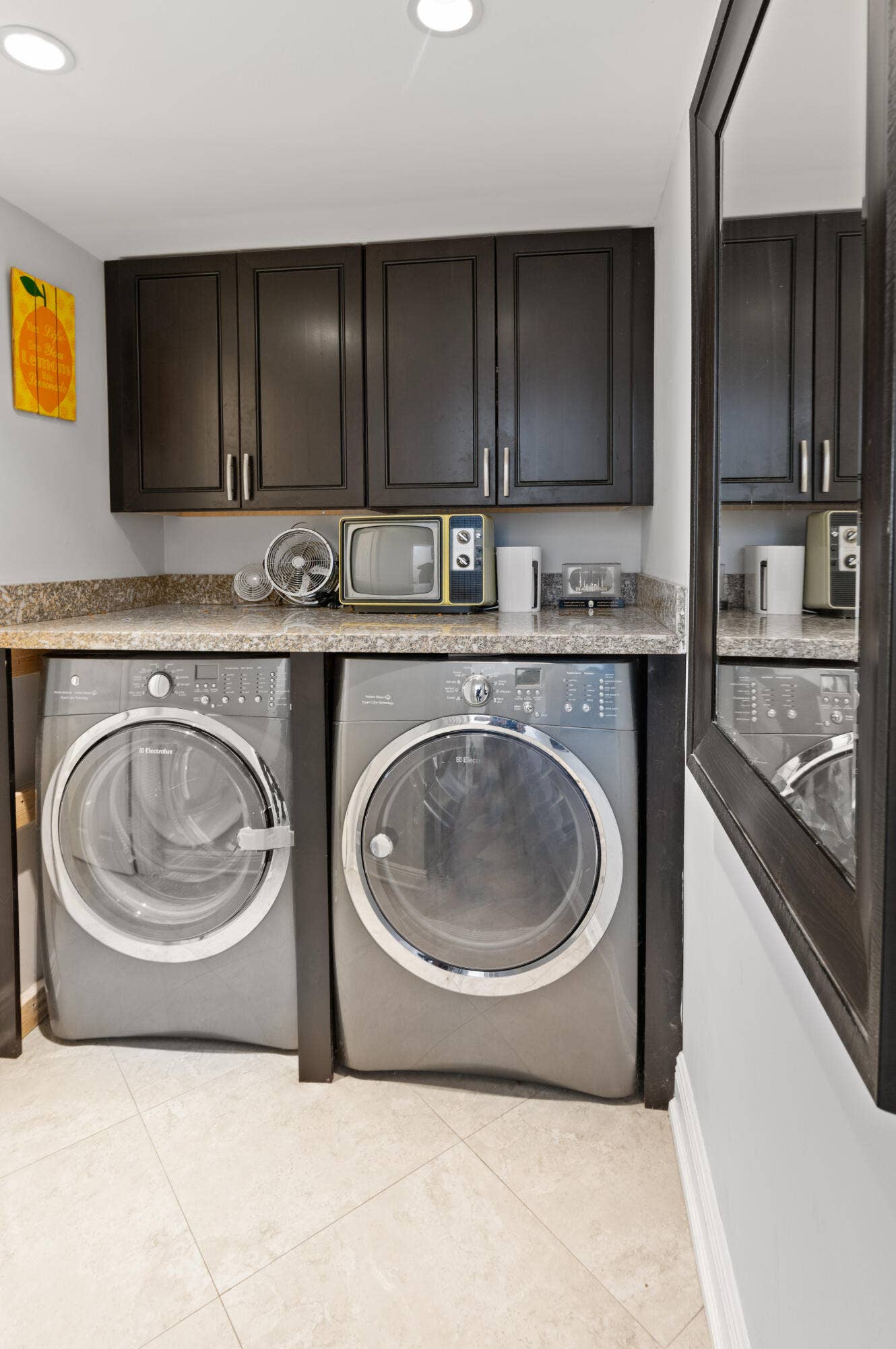 laundry room with storage