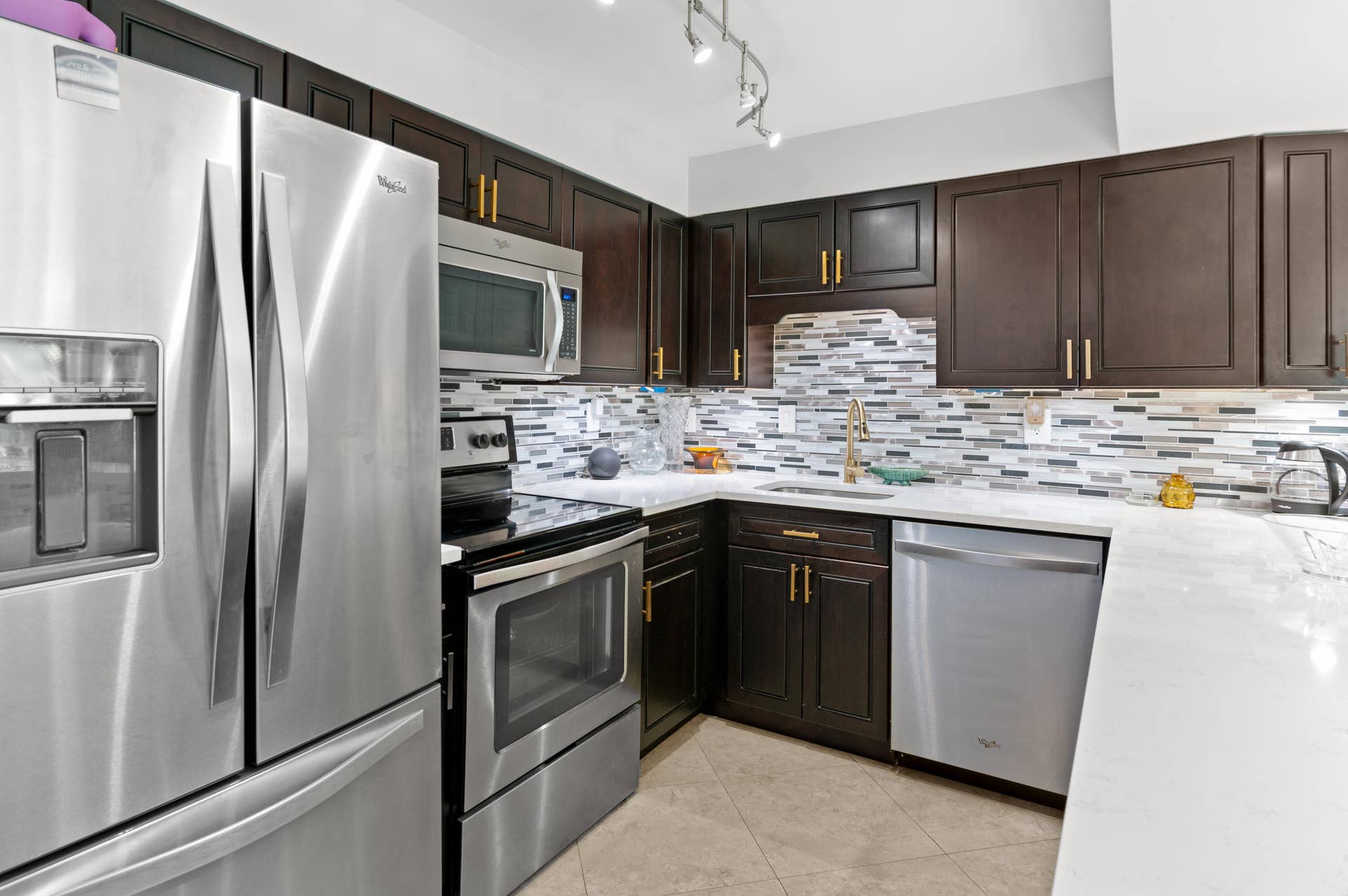 beautiful renovated open kitchen with quartz