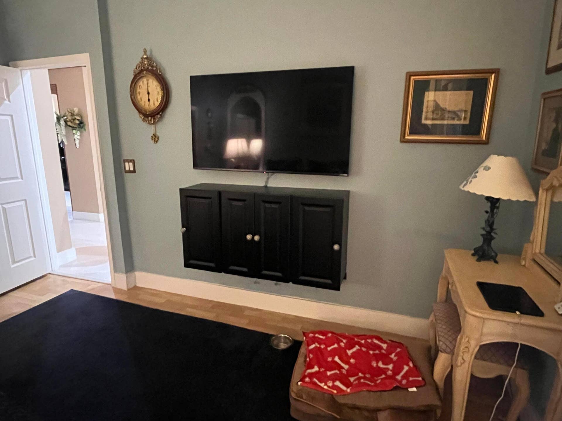 6108 Petunia Road, Delray Beach, FL 33484 flat screen mounted on the bedroom wall
