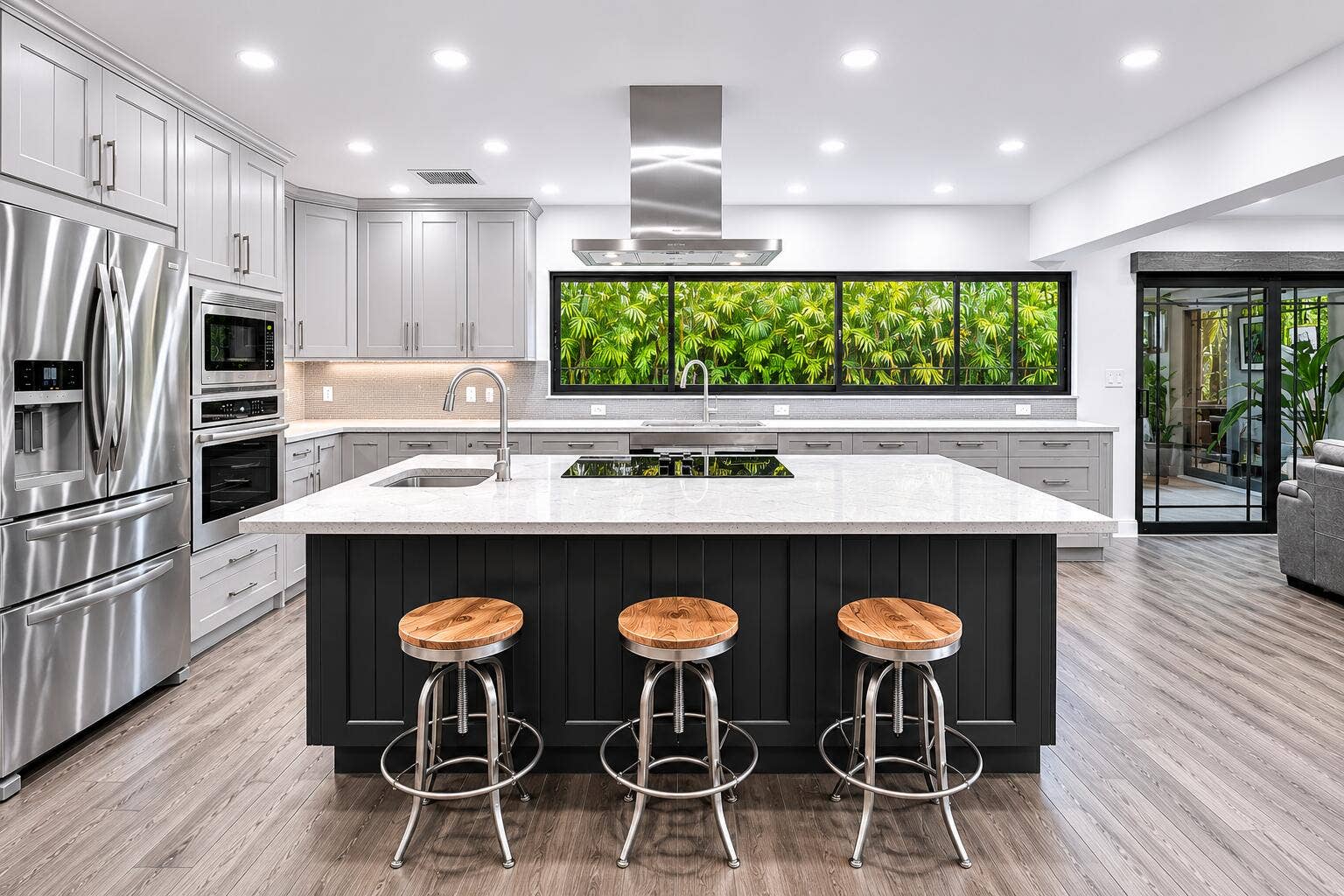 Virtually reimagined kitchen with lighter cabinetry & larger window.