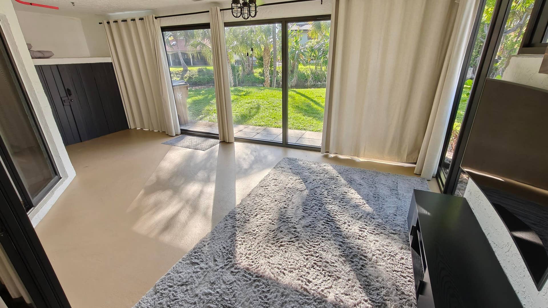 385 NW 36th Avenue, Deerfield Beach, FL 33442 Back enclosed patio additional living space- lockable enclosed storage closet to left in photo