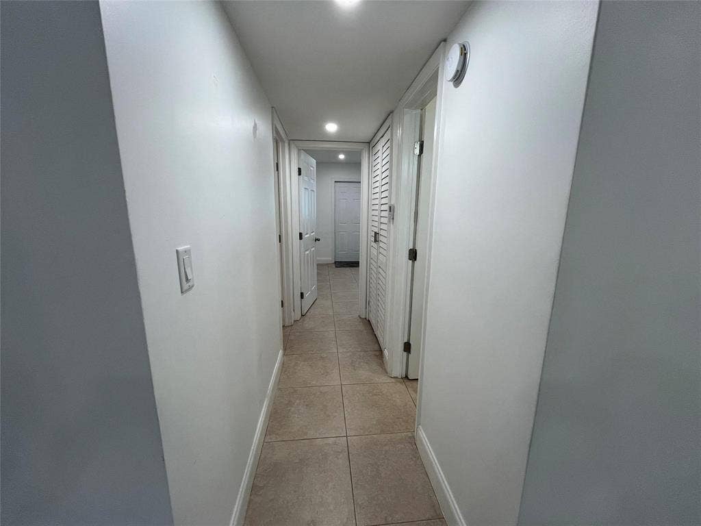 Hallway leading to the primary and second bedrooms