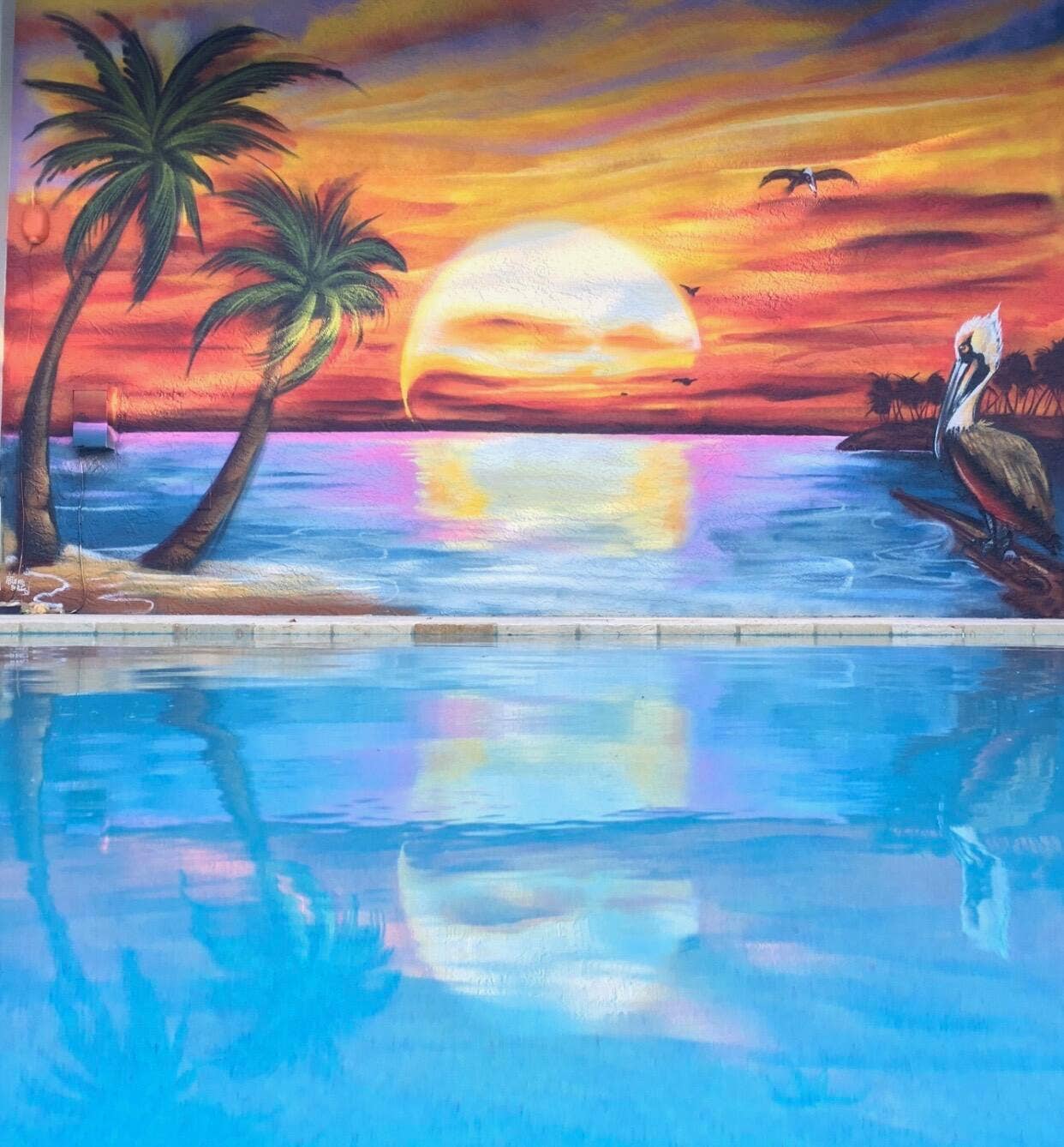 126 Faith Way, Jupiter, FL 33458 Wall mural reflected in the pool!