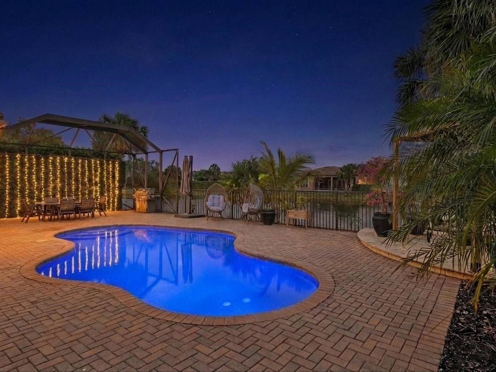 10982 NW 81st Manor, Parkland, FL 33076 twilight pool