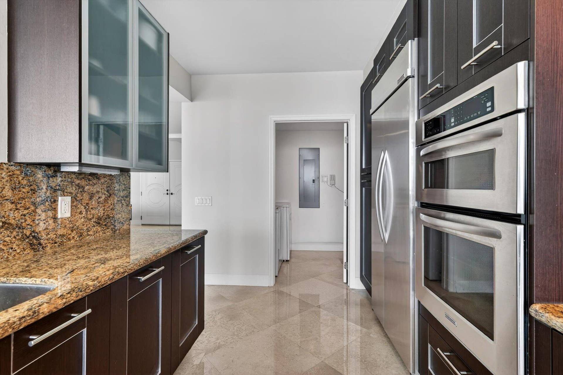 801 Briny Avenue, #1501, Pompano Beach, FL 33062 Designated laundry room conveniently located just off the kitchen.