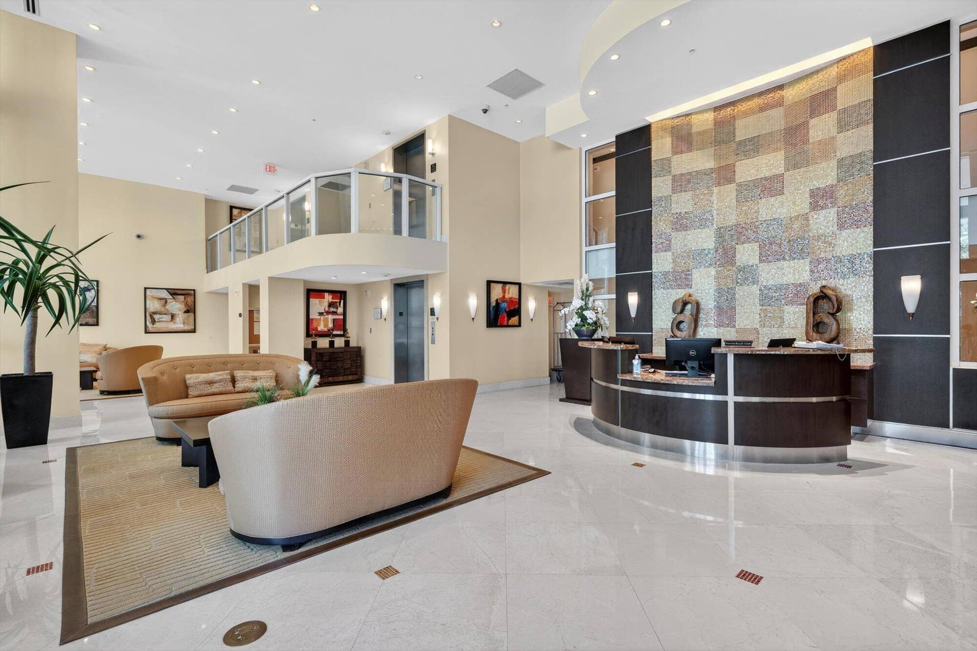 801 Briny Avenue, #1501, Pompano Beach, FL 33062 Elegant Sonata lobby with a warm, welcoming feel