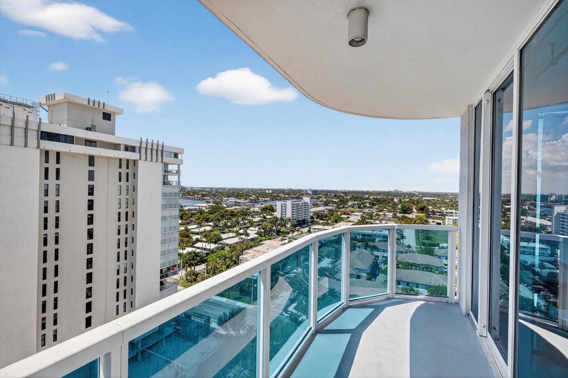801 Briny Avenue, #1501, Pompano Beach, FL 33062 Balcony off of Second Bedroom with city views and some ocean next photo