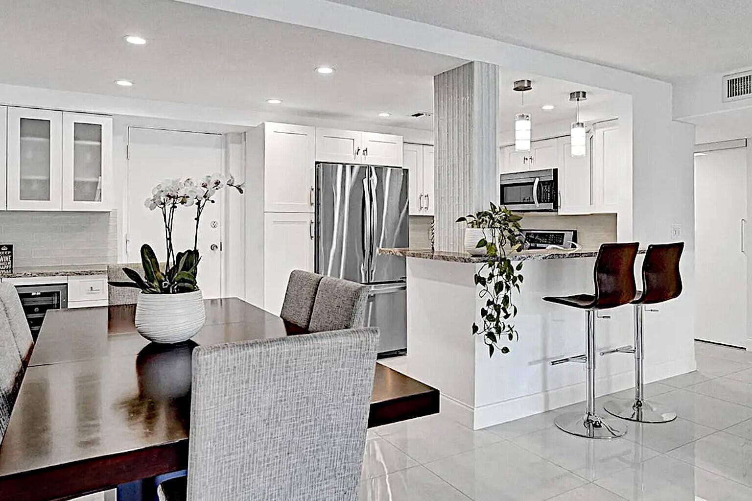 Granite countertops, wine cooler, unique hardware.
