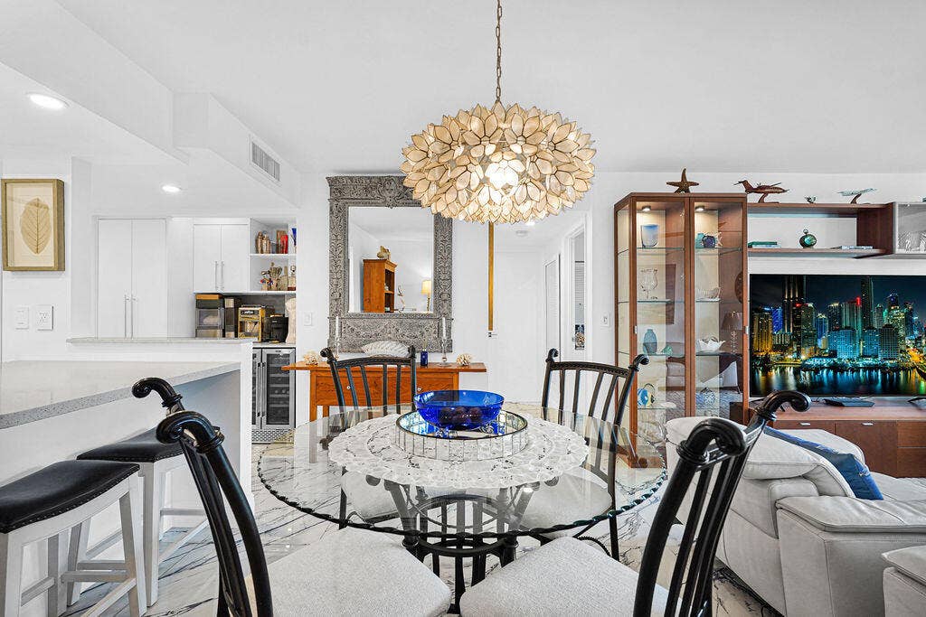 Dining area with beautiful chandelier included