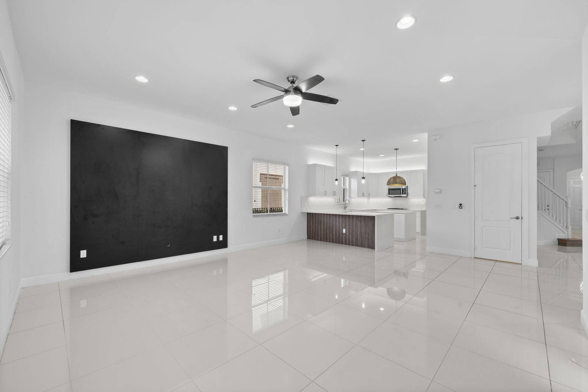 Designer wall panels and custom built-ins professionally installed and included with the home