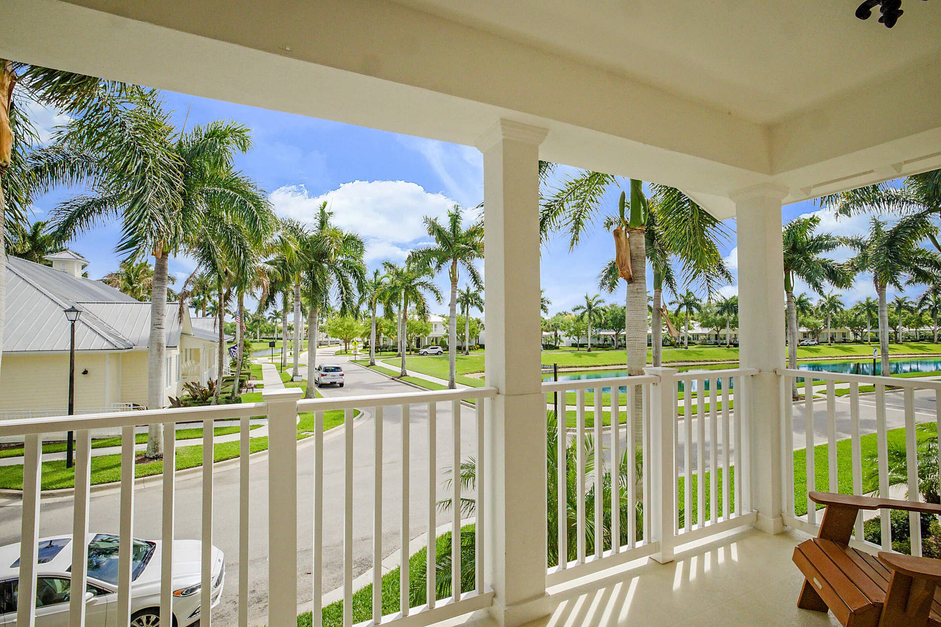 3414 W Mallory Boulevard, Jupiter, FL 33458 Front balcony with view of amenity center