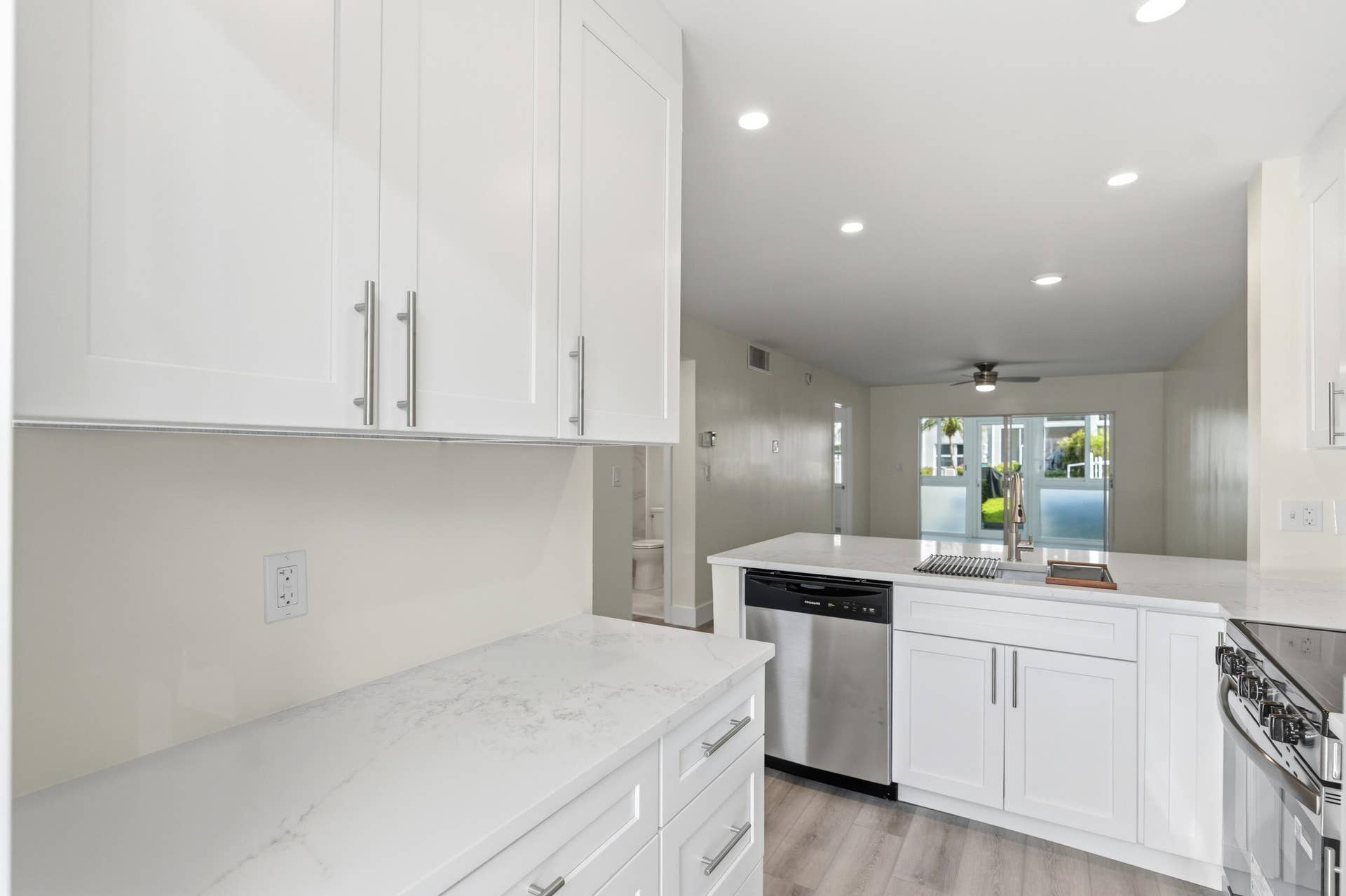 A brand NEW custom kitchen with quartz countertops, Eat in Bar, soft-close cabinets, stainless-steel appliances and ALL NEW ELECTRIC, PLUMBING, AC, AND HWH!