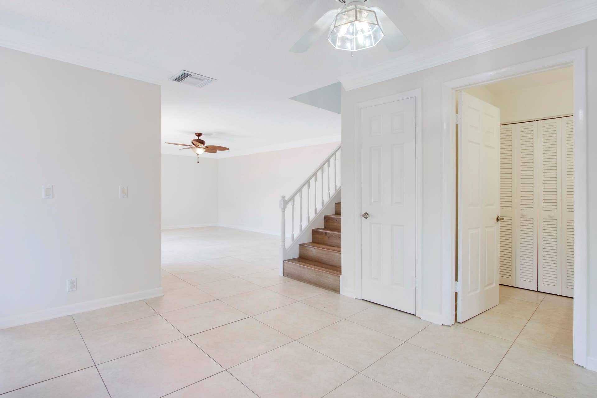 326 Jupiter Lakes Boulevard, #2318d, Jupiter, FL 33458 Here is the view from the dining area into the living room.