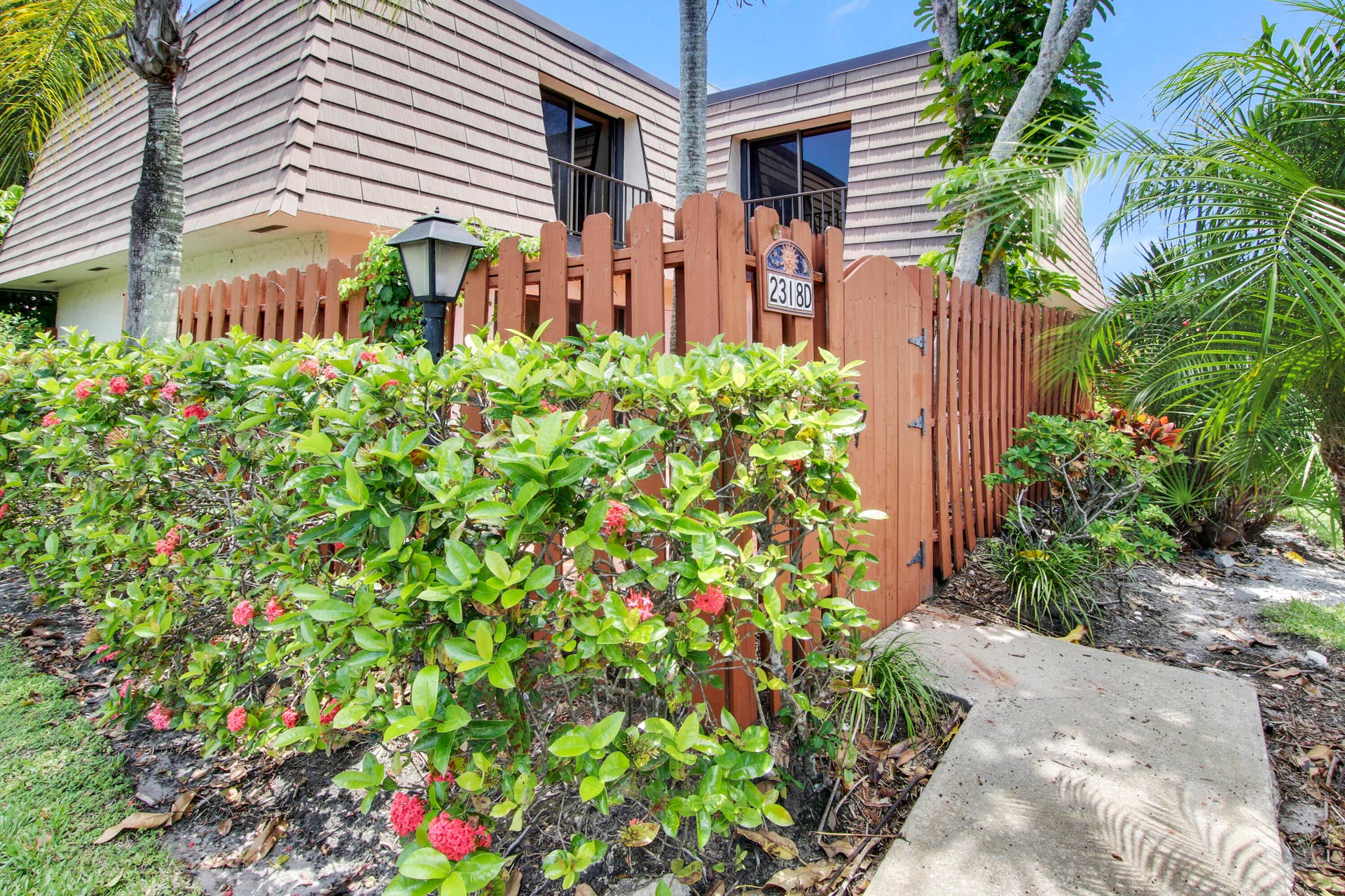 326 Jupiter Lakes Boulevard, #2318d, Jupiter, FL 33458 Enter through the gate to the unit's private patio.