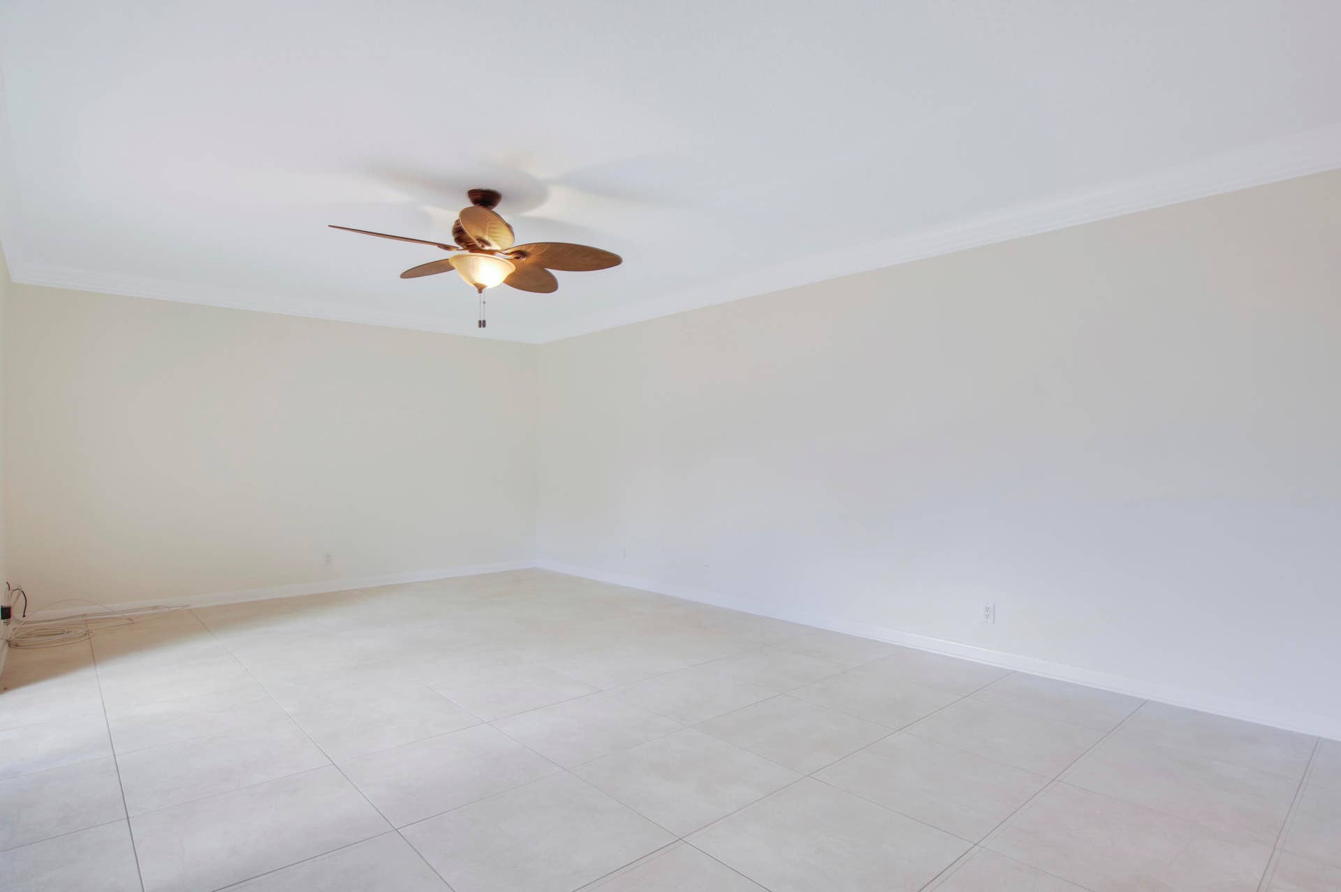 326 Jupiter Lakes Boulevard, #2318d, Jupiter, FL 33458 Neutral tile covers the first floor.